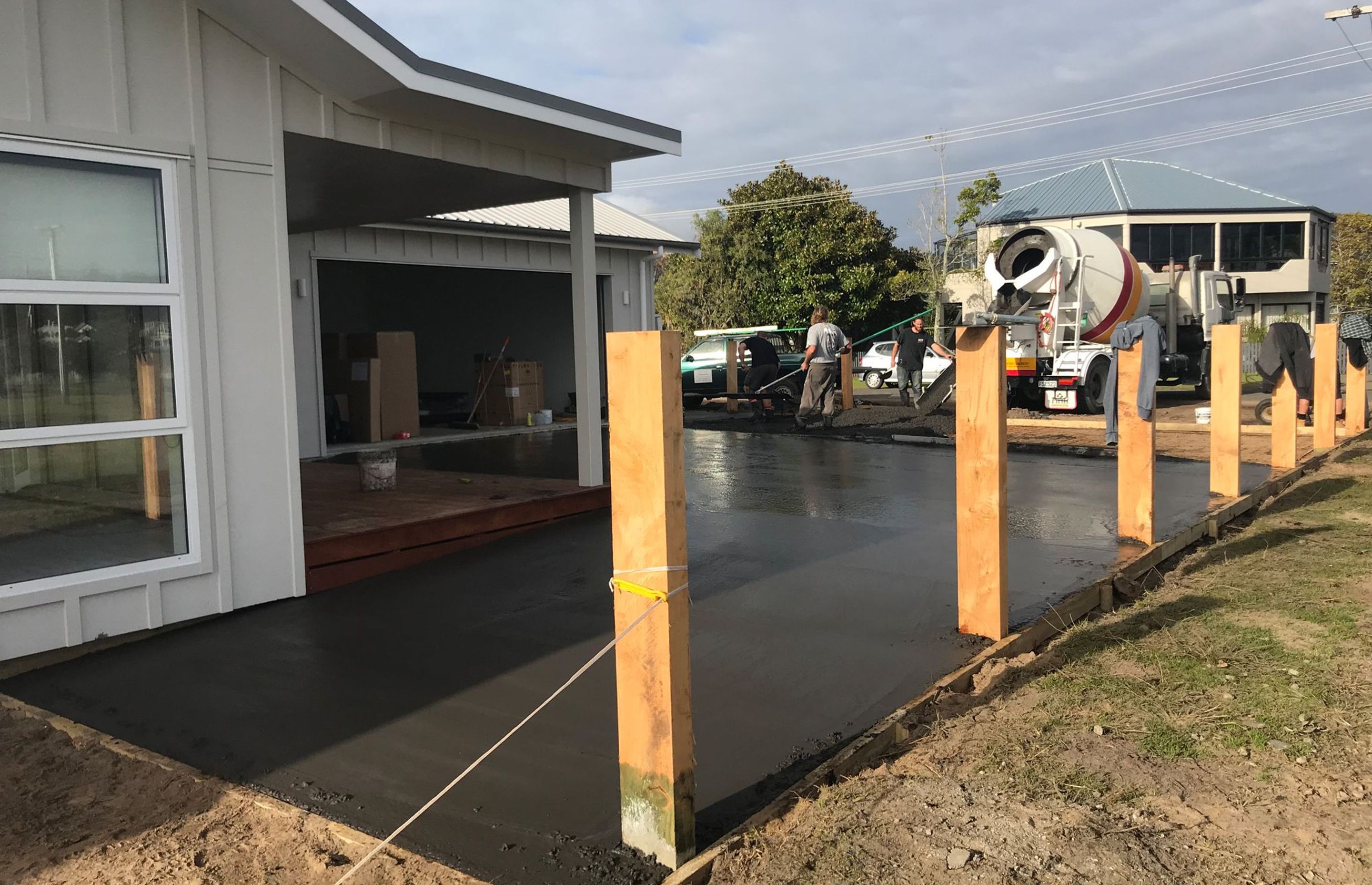 The important last steps with the exposed aggregate driveway being poured.