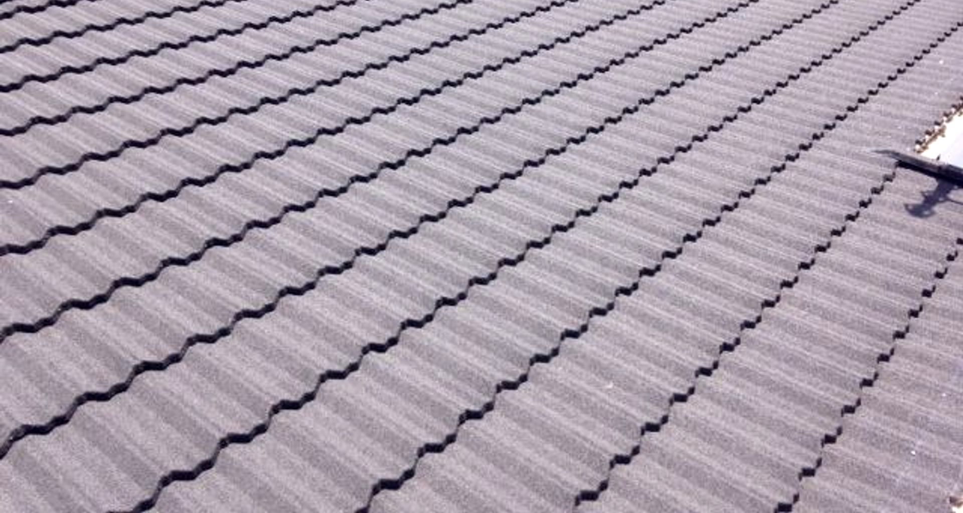 Some profiles allow you to choose either a textured or satin finish on the surface of your roof. Both have their merits but a textured stone finish is inclined to look a little more substantial yet visually softer; satin finishes tend to produce a smoothe