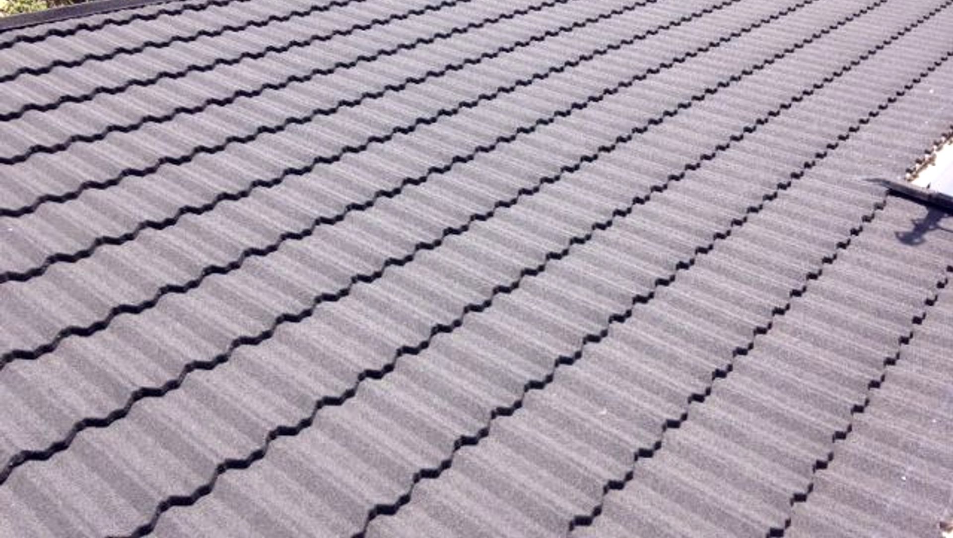 Some profiles allow you to choose either a textured or satin finish on the surface of your roof. Both have their merits but a textured stone finish is inclined to look a little more substantial yet visually softer; satin finishes tend to produce a smoothe