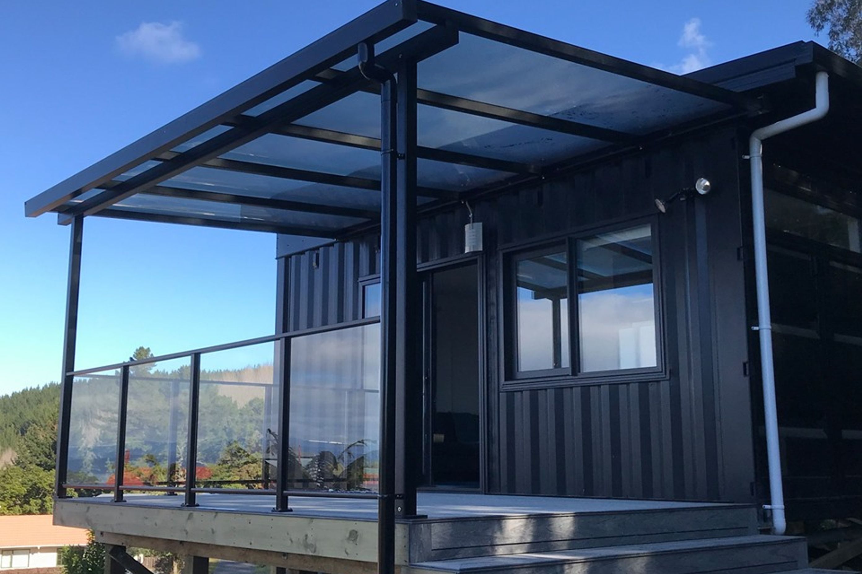 Covered deck off kitchen and living areas