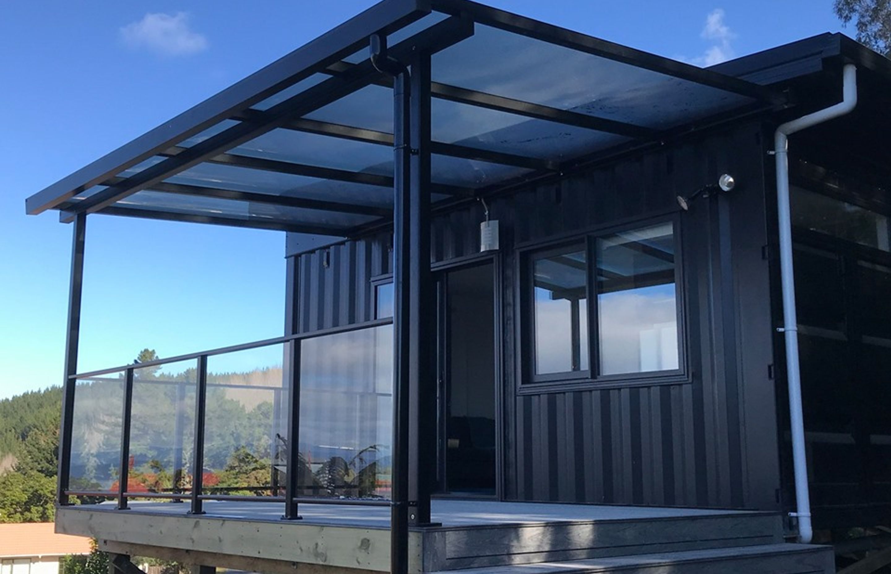 Covered deck off kitchen and living areas