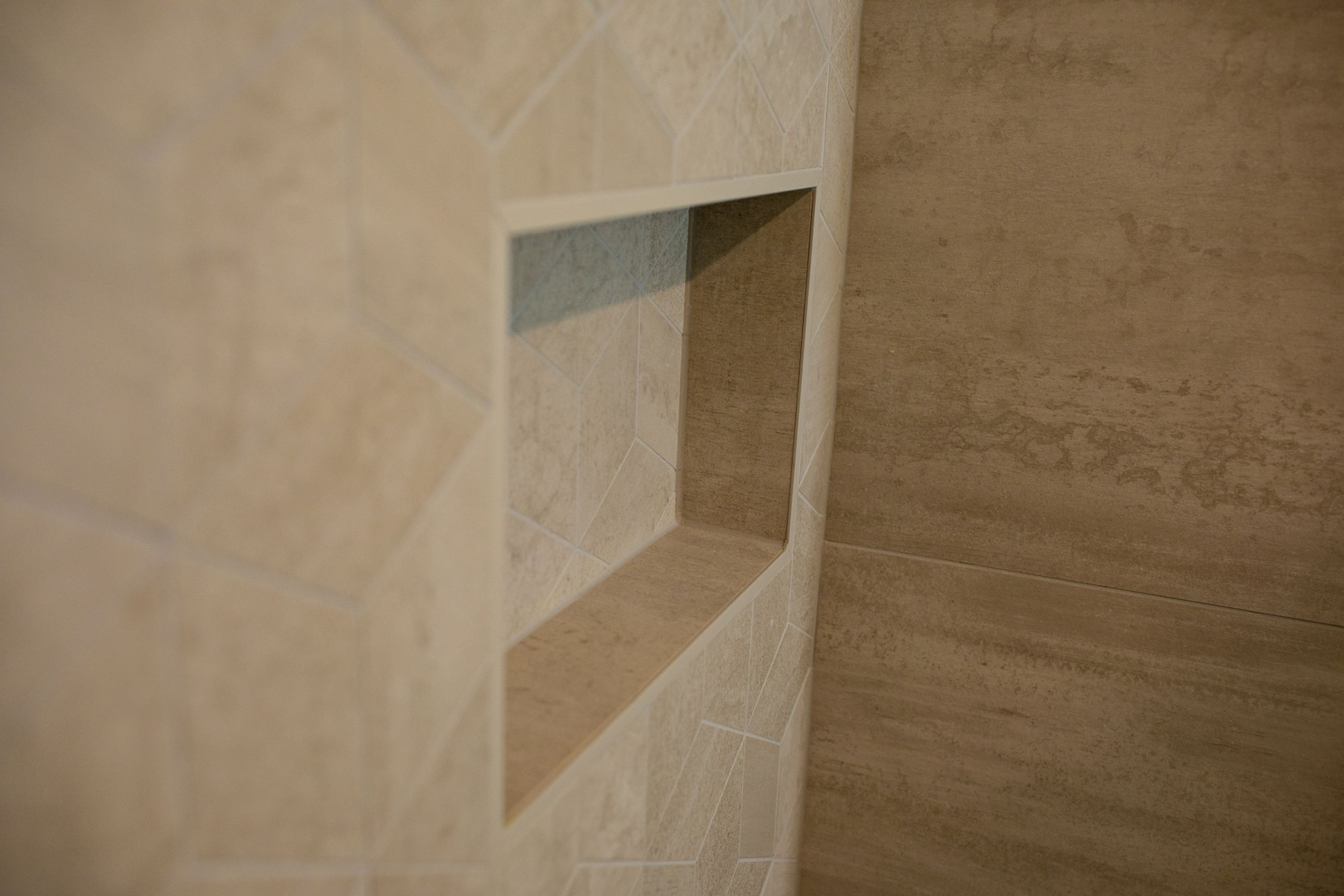 Downstairs Bathroom - Tiled niche with tile trim powder coated to match