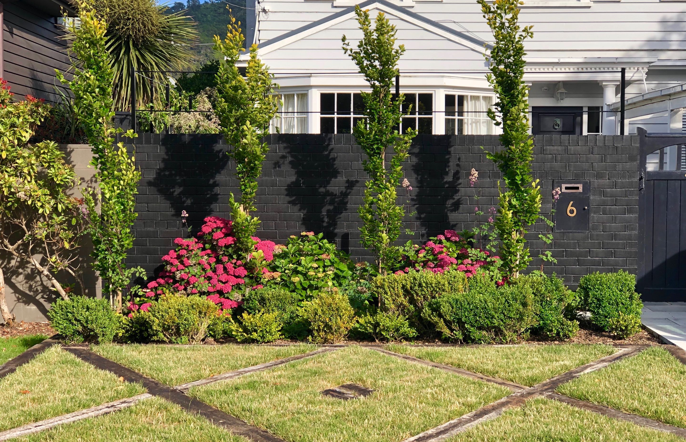 Street view of 6 Izard Rd &amp; the new railway sleeper parterre