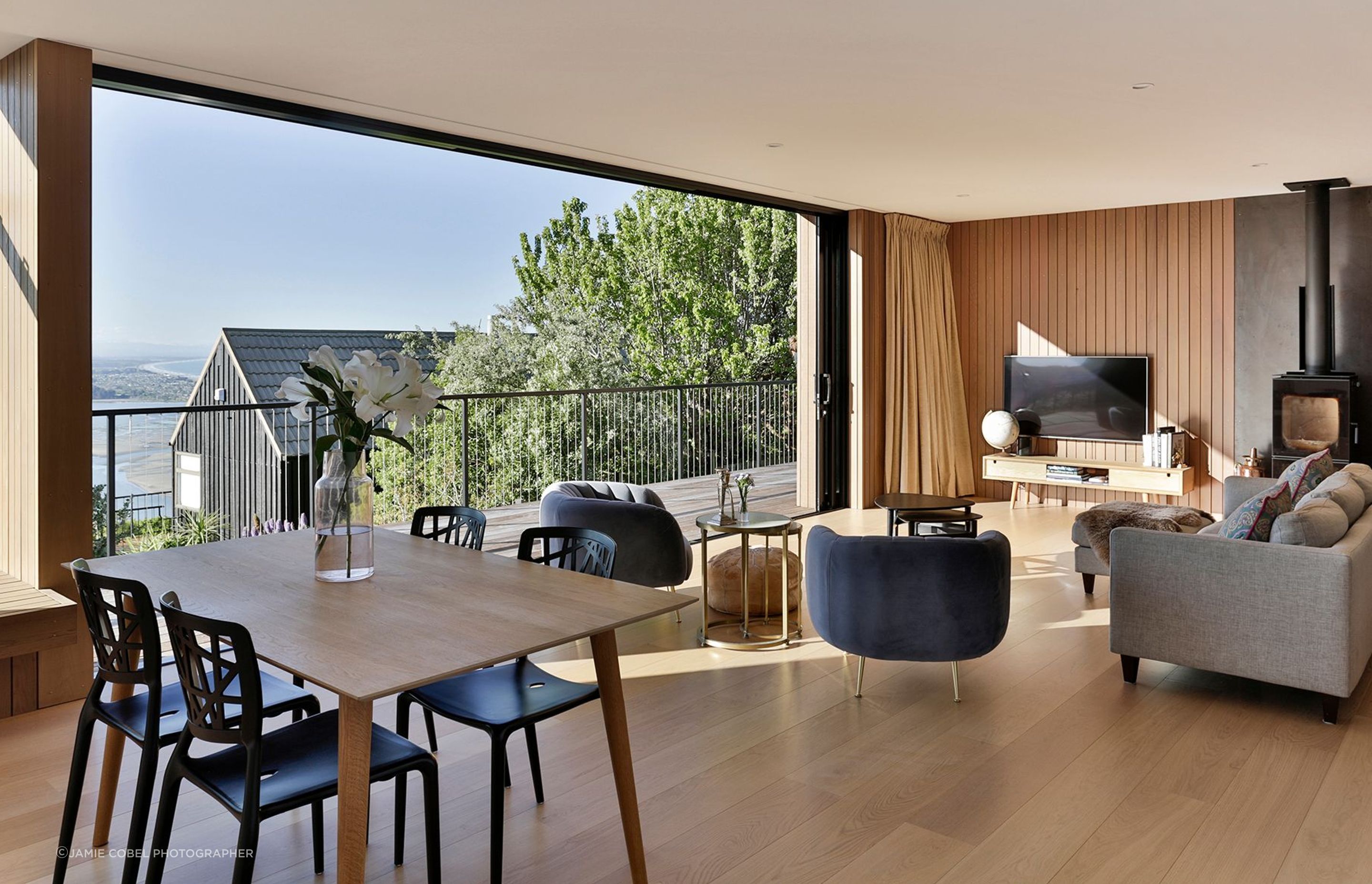 Even though there are neighbours fairly close by,  the home still feels very private due to its arrangement and the established trees on the site.