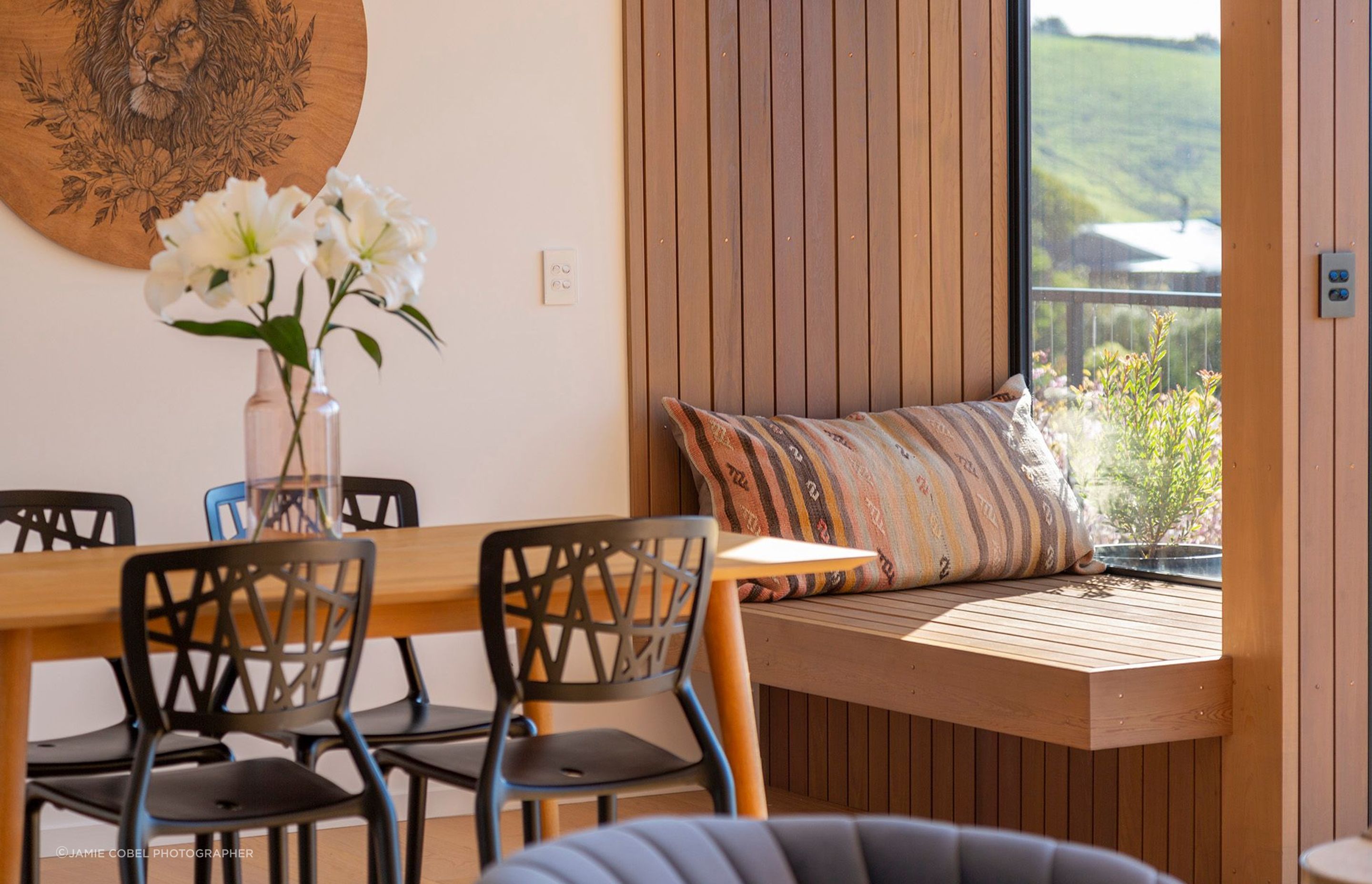 The exterior vertical shiplap cladding has been brought into the interior to marry the inside and outside and to provide warmth and homeliness to the design.