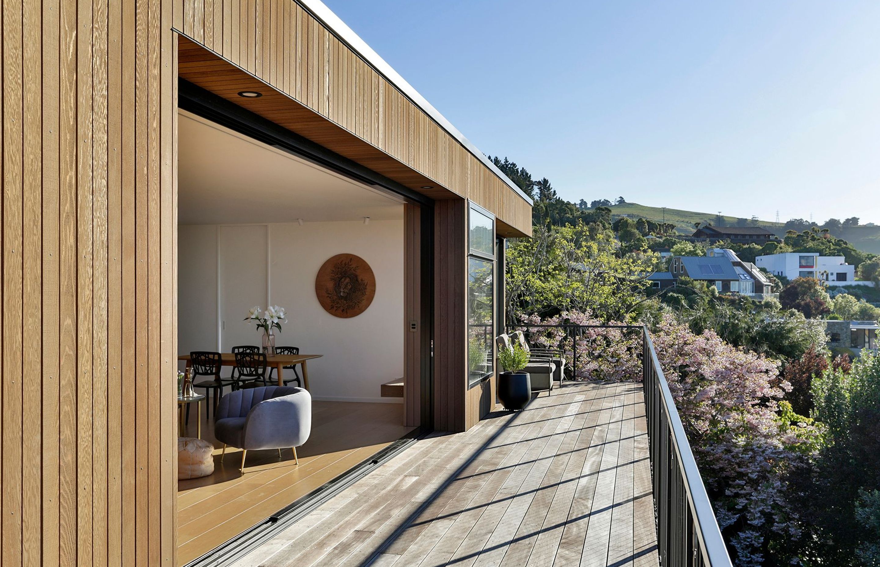 The front deck enjoys elevated views in three directions over the landscape.
