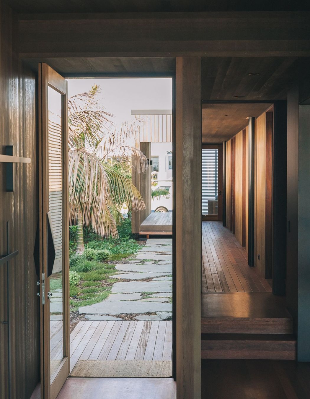 The walkway between street and front door offers a glimpse into what's to come. 