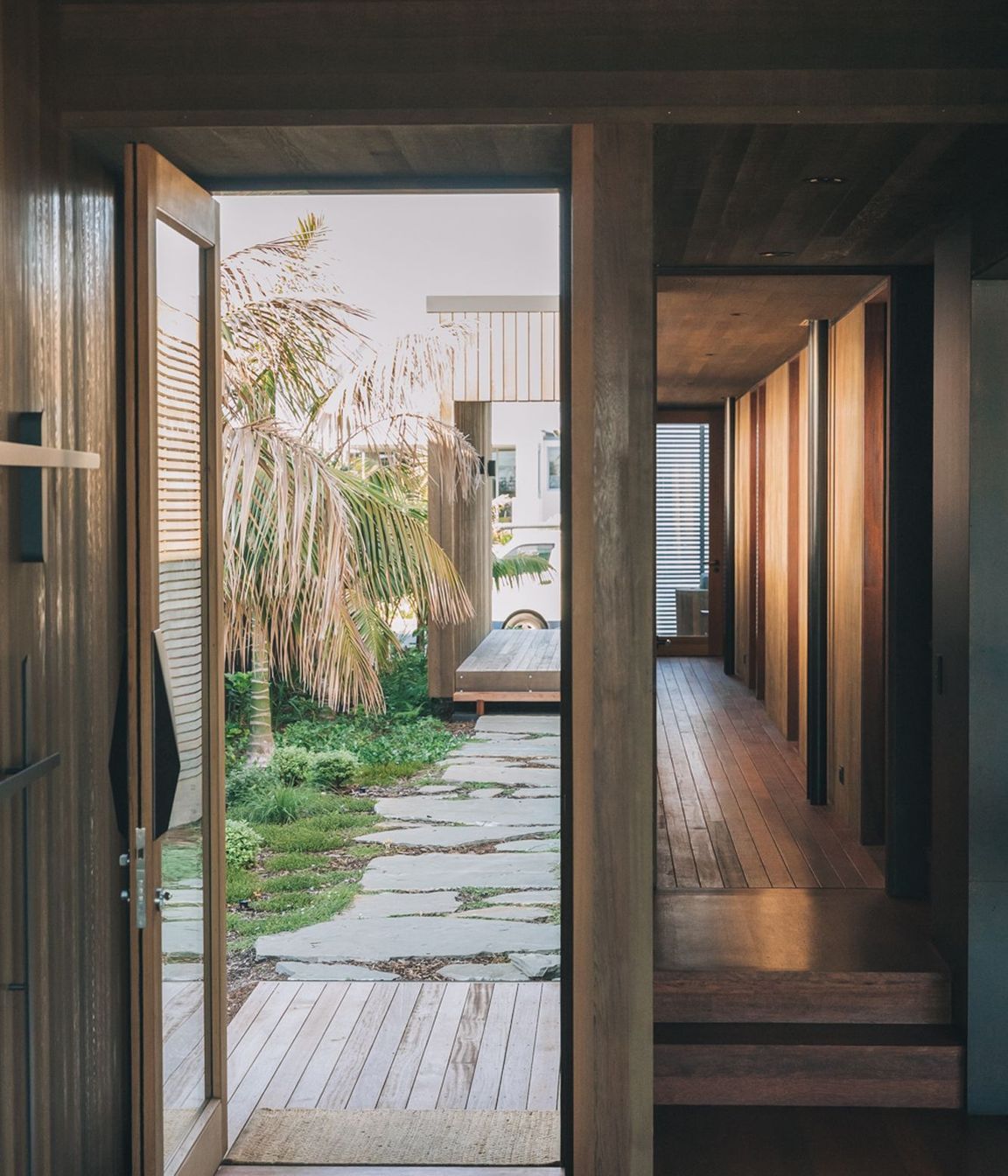 The walkway between street and front door offers a glimpse into what's to come. 