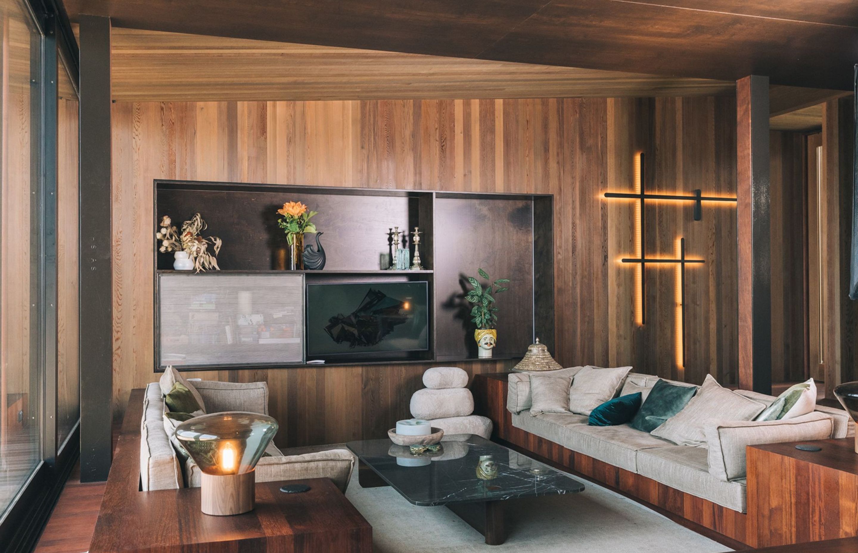 Custom steel cabinetry is a key feature of the living area.