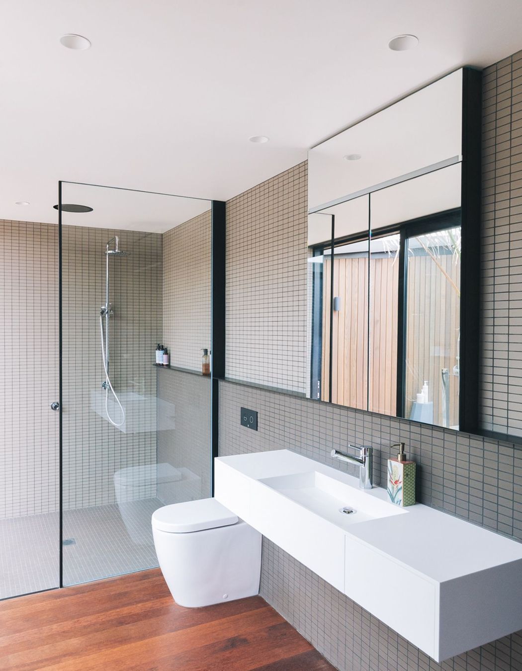 Finished with a water-based polyurethene, the timber flooring extends throughout the home.