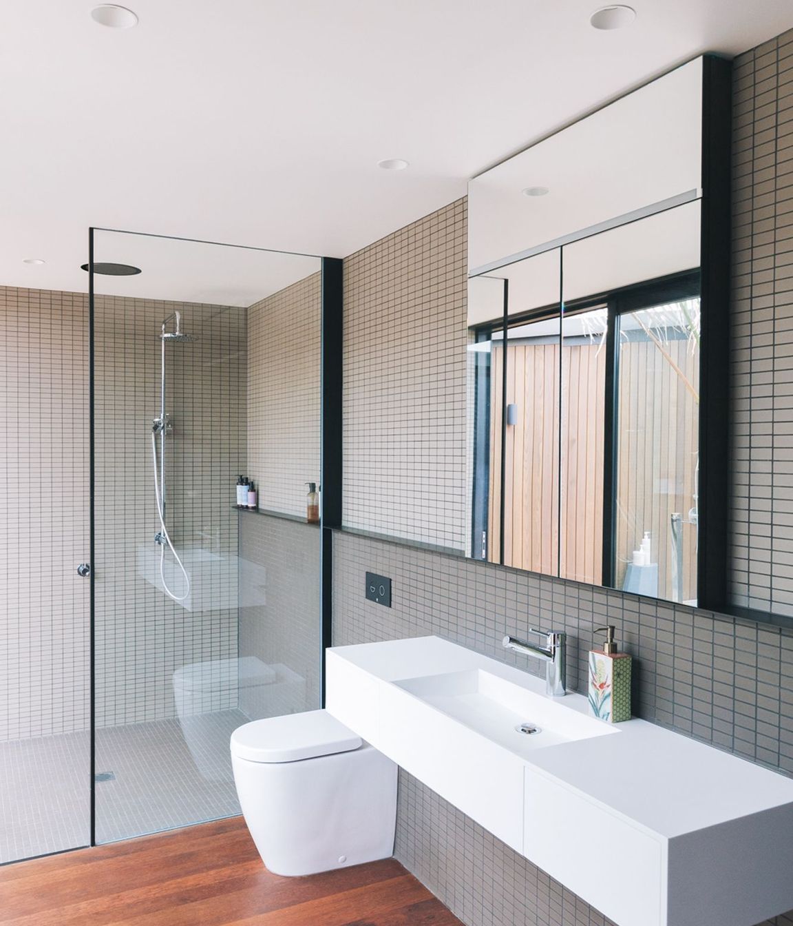 Finished with a water-based polyurethene, the timber flooring extends throughout the home.