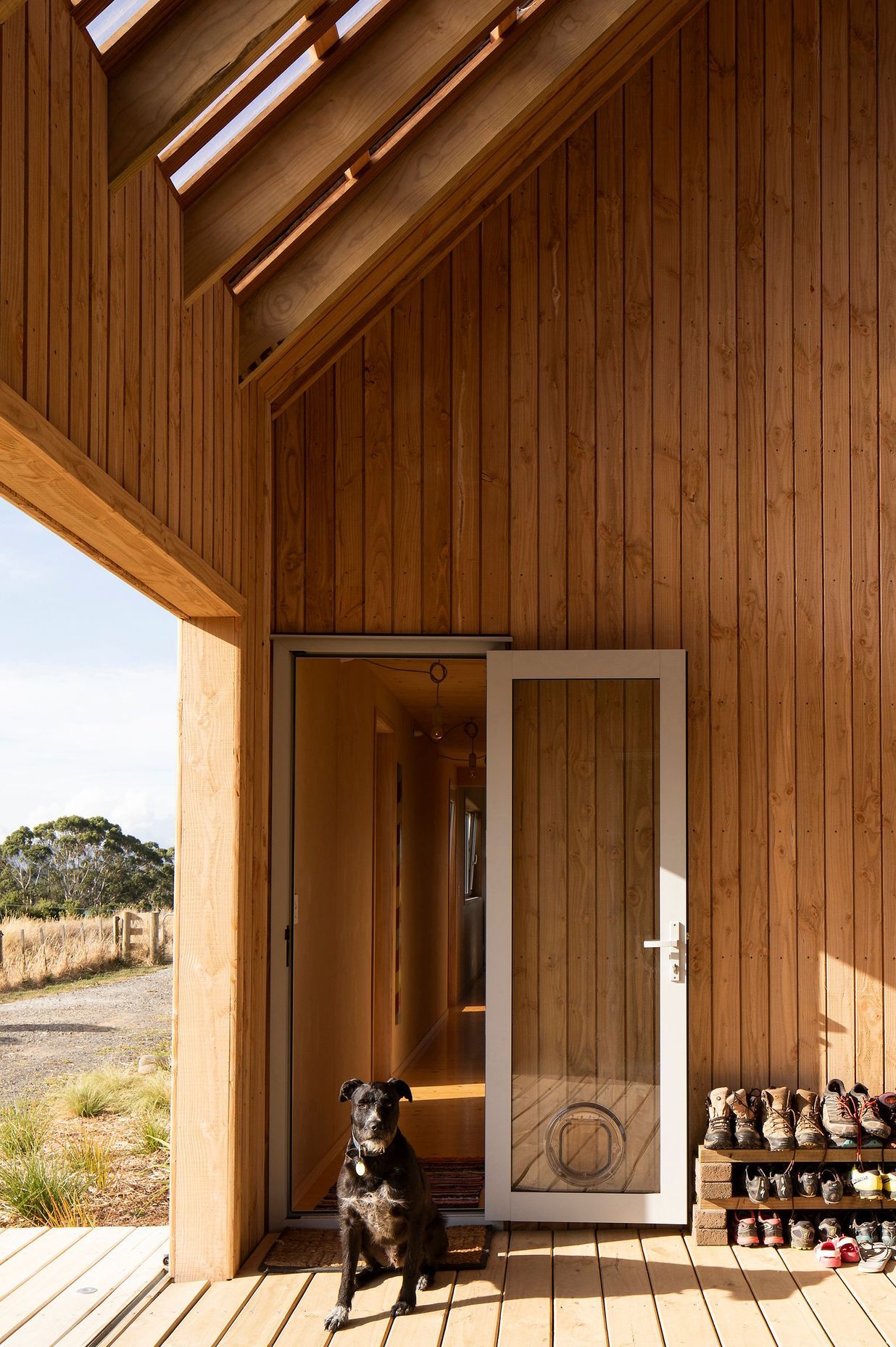 The family pooch guards the entrance to the corridor that leads to the main living areas.