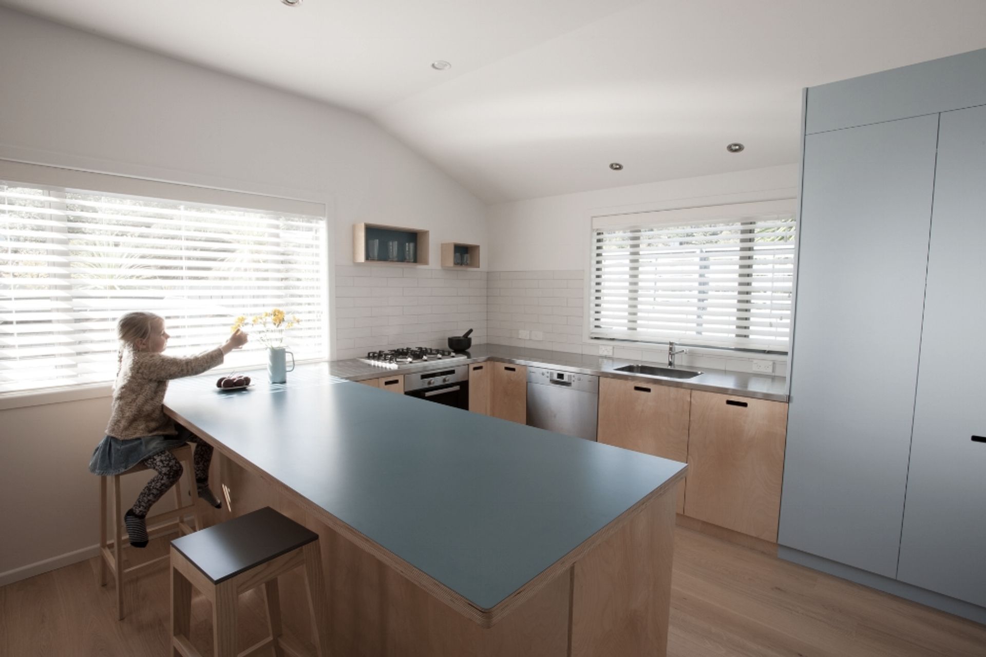 Shoreditch S.210 High stools in American Ash sit at the bar.<br />Designed, manufactured and installed by Shoreditch