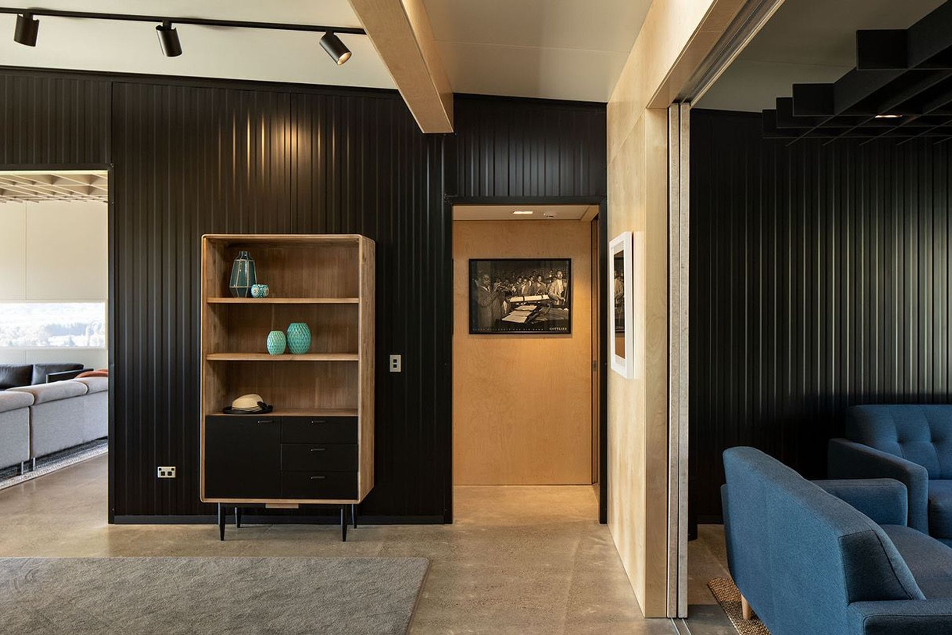 Prefabricated Metalcraft panels are a key feature of the house, making up both the internal walls as well as the exterior cladding. Photograph: Simon Devitt.