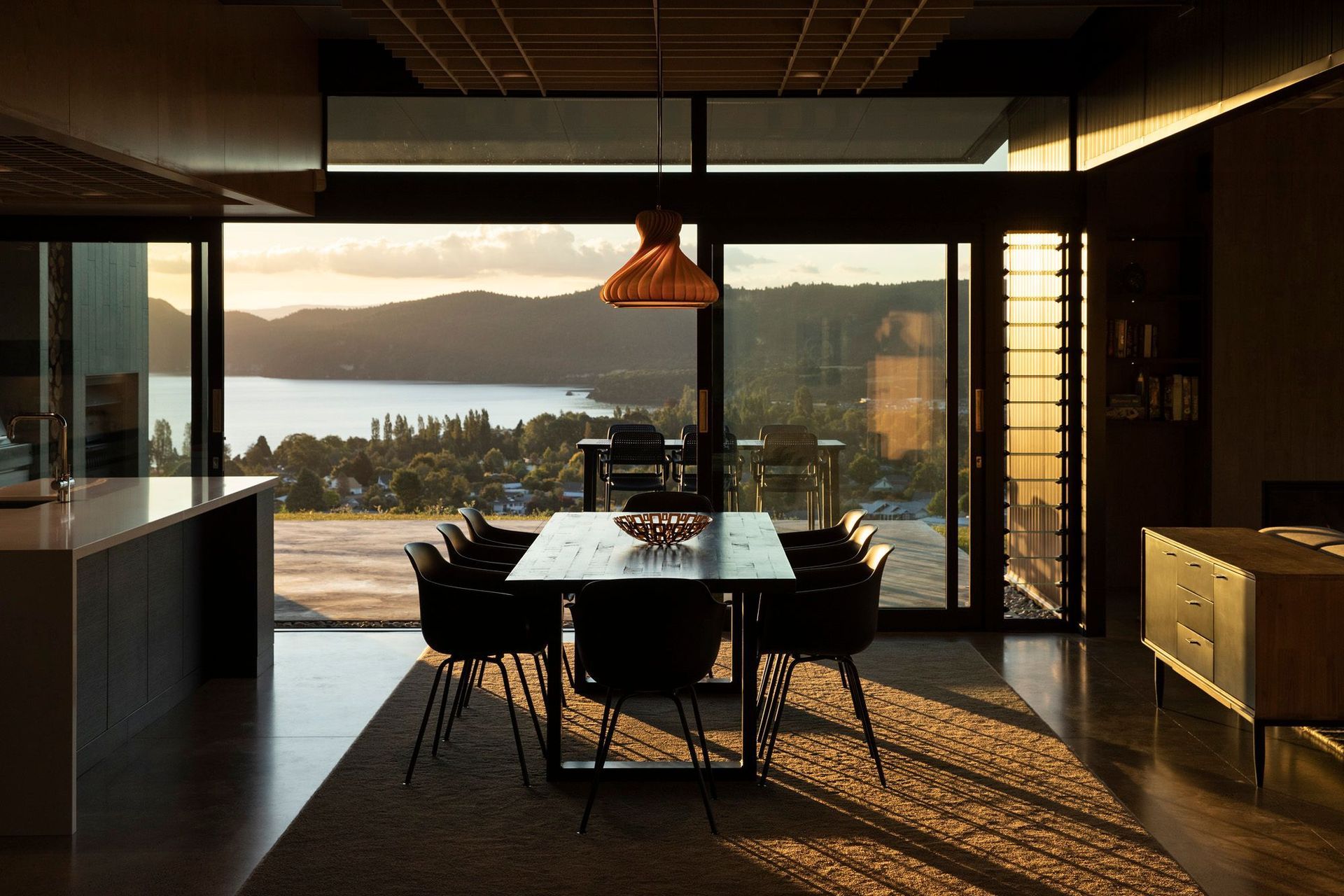 The dining area at dusk is possibly the most delicious time of day to watch the incredible sunsets over Lake Taupo. Photograph: Simon Devitt.