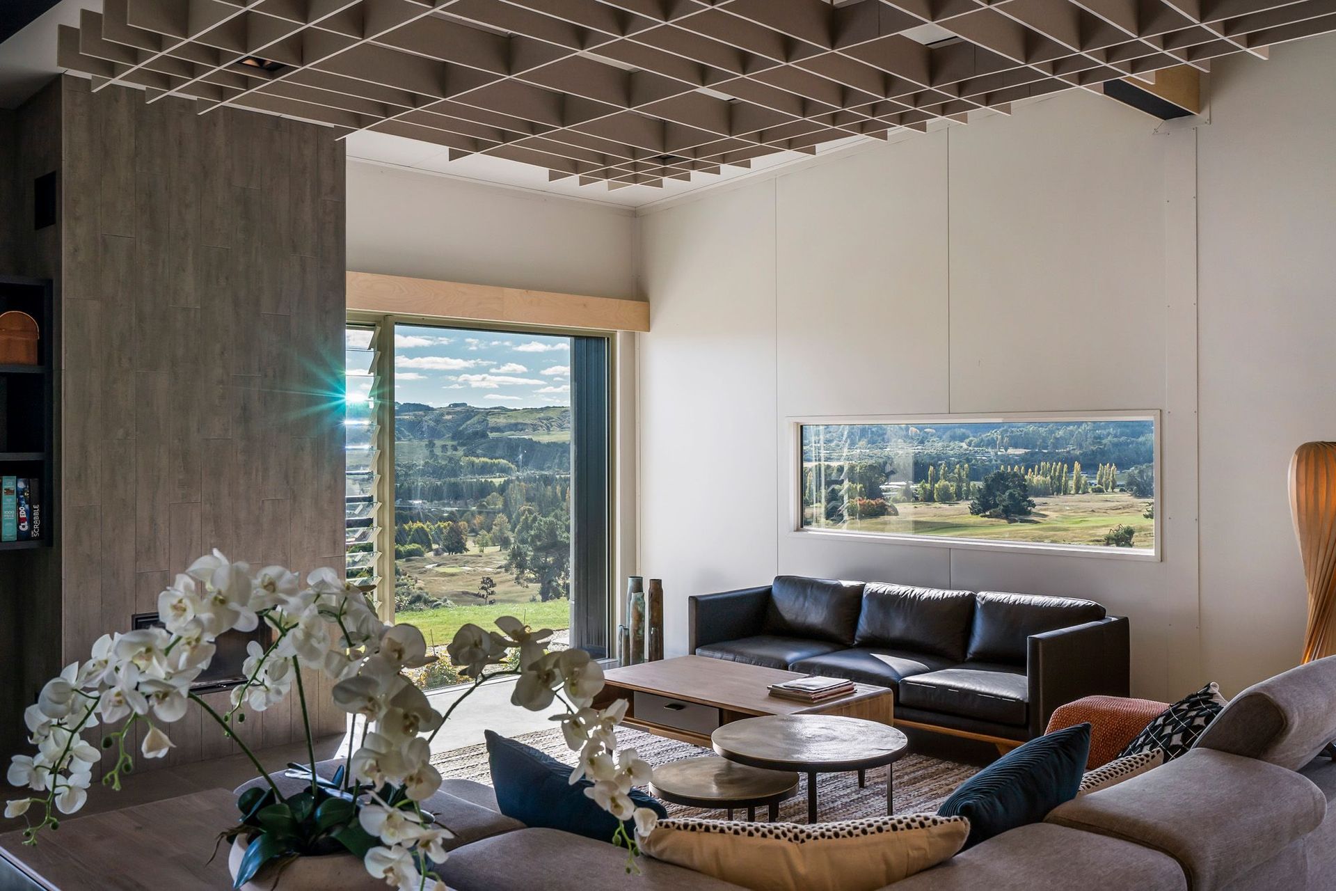 An acoustic waffle over the lounge area adds to the cosiness and intimacy of this space. Photograph: ArchiPro.