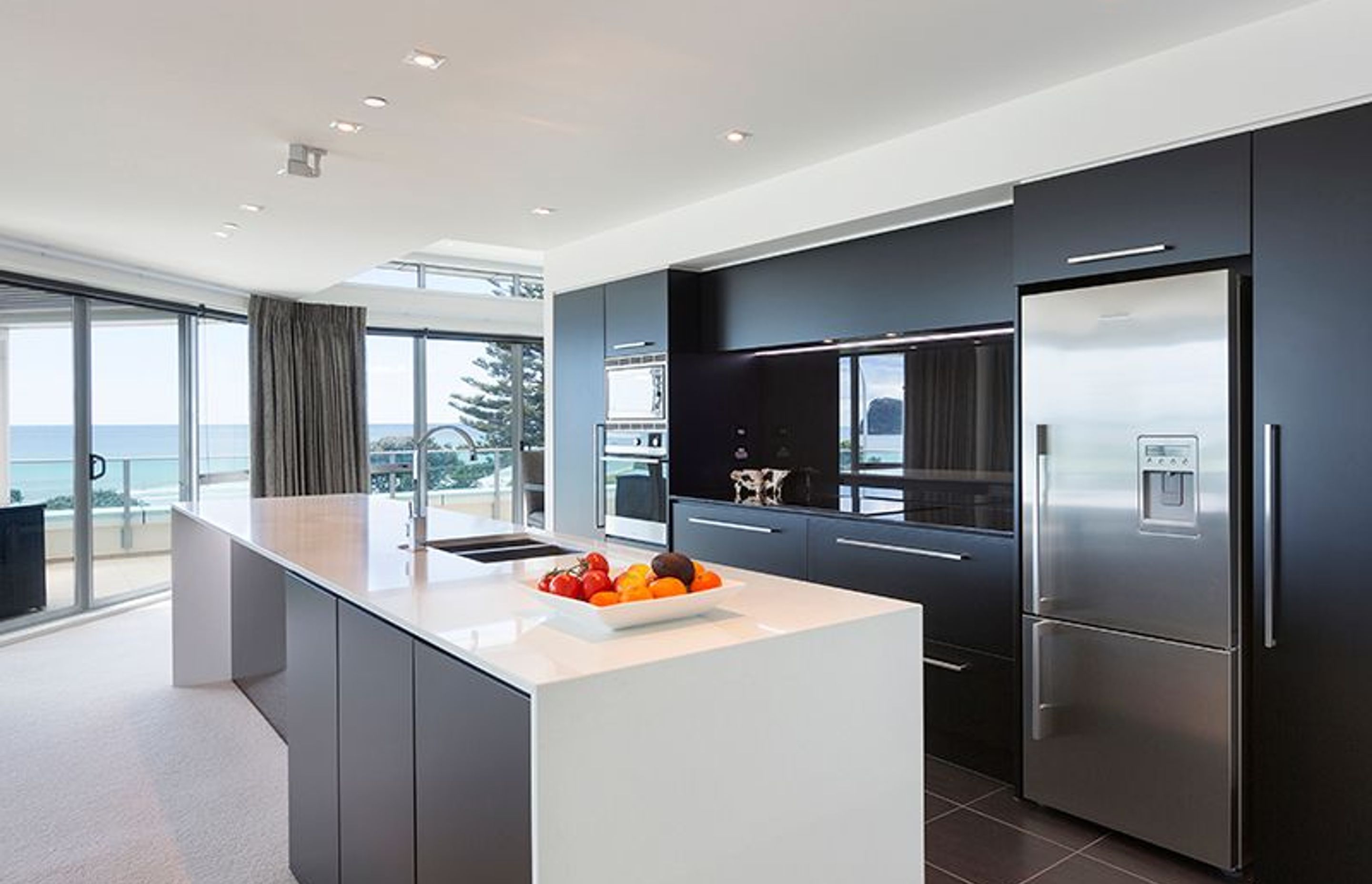 Open plan kitchen, takes advantage of panoramic beach views