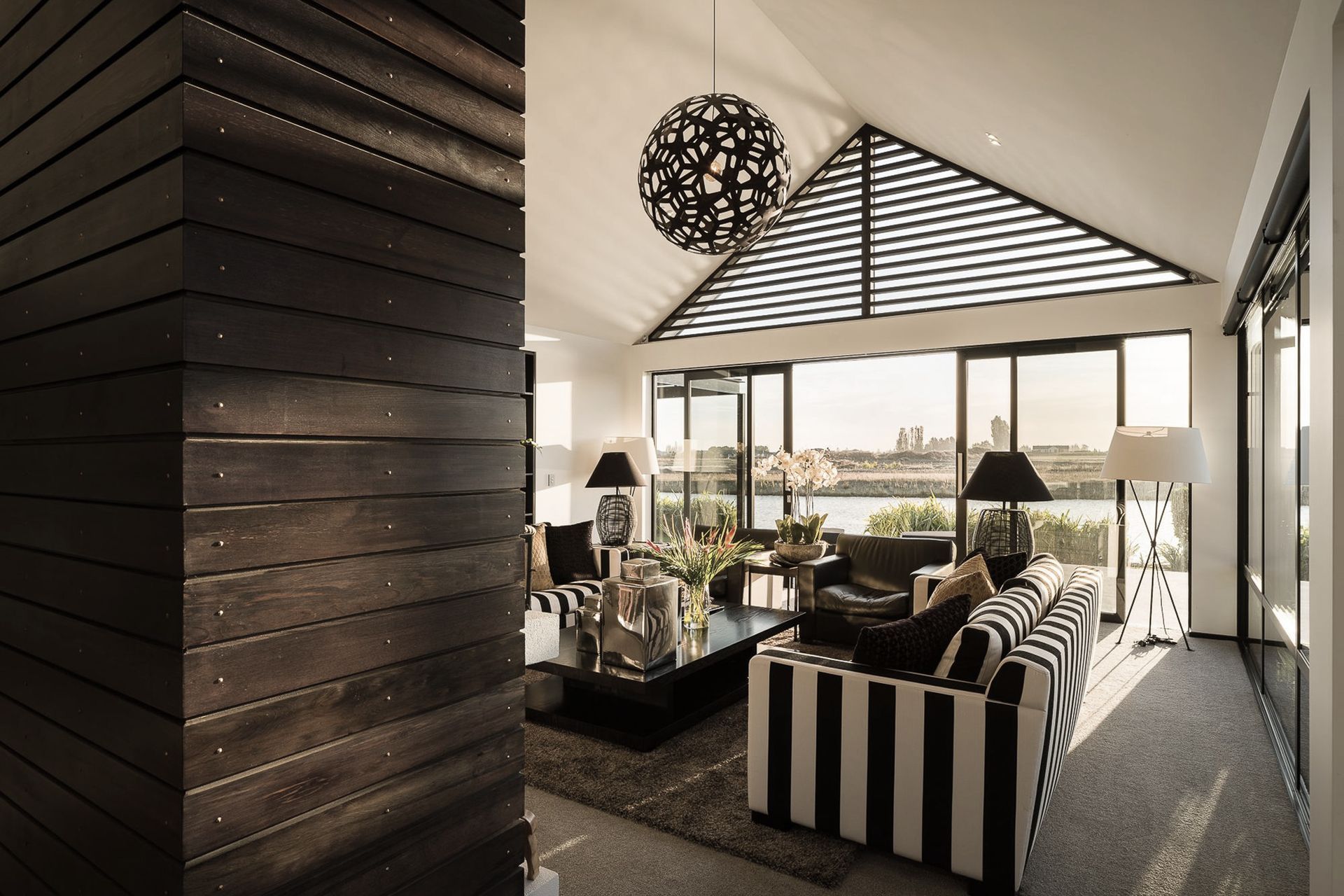 The expansive water views are revealed little by little as visitors move through the house.