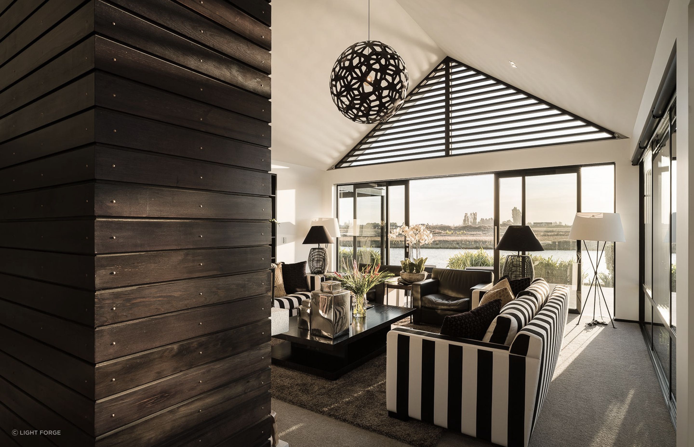 The expansive water views are revealed little by little as visitors move through the house.