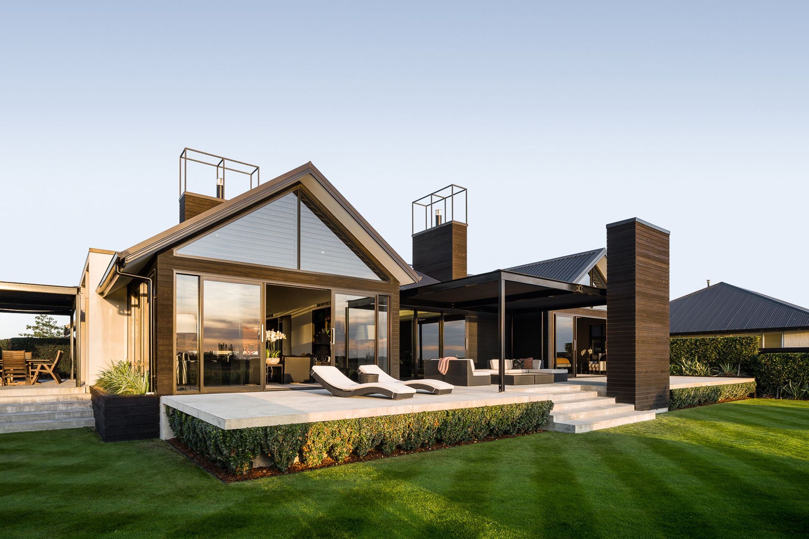 A west-facing verandah runs the length of the house and provides ample outdoor living while a smaller, north-facing verandah is accessed via the kitchen.