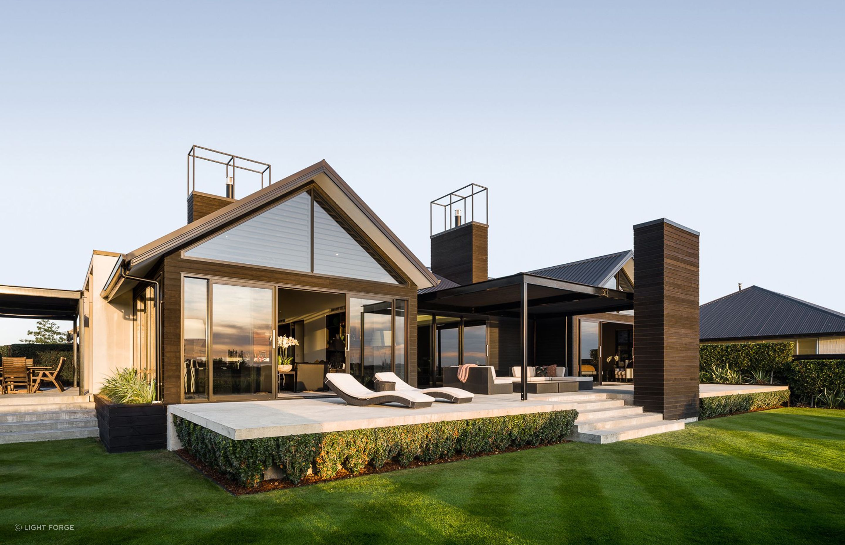 A west-facing verandah runs the length of the house and provides ample outdoor living while a smaller, north-facing verandah is accessed via the kitchen.