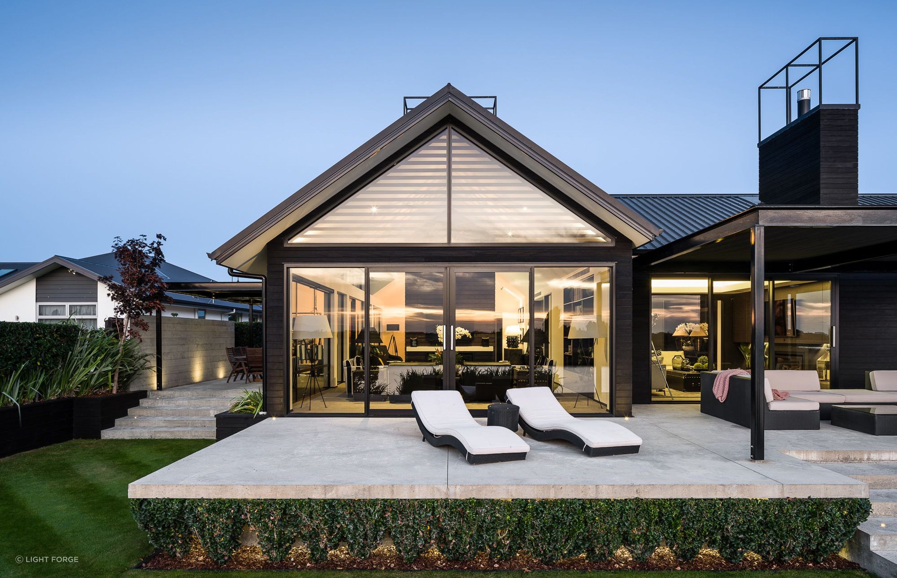 The architect's response was to design a home that made use of extensive glazing to allow the view to come to the fore.