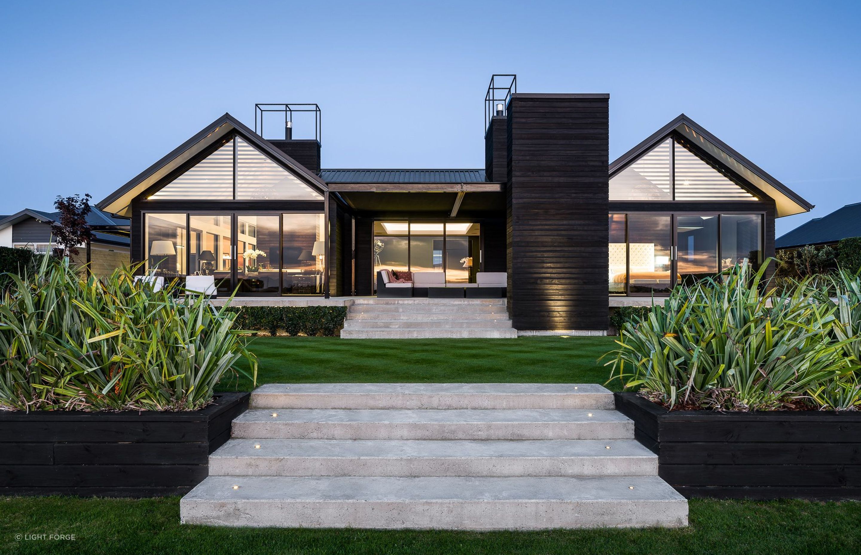 The owners of this house wanted a home that provided ample opportunity to interact with the outdoors and that had a timeless quality about it.