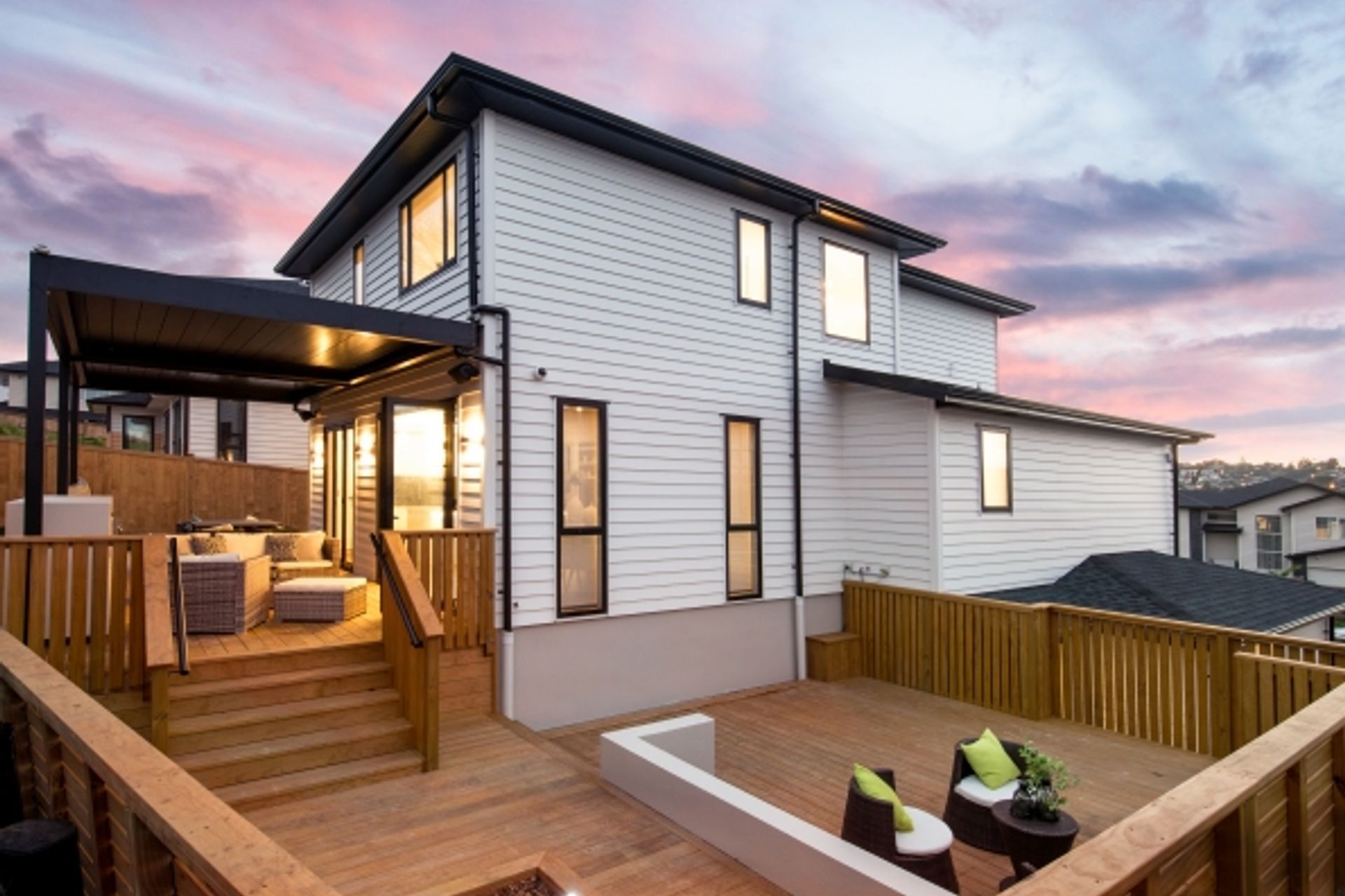Lagonda Rise - Prime Grade Solid American White Oak in Herringbone Parquet w/ a two plank border and finished with a stain in 'Jacobean' and Waterborne Polyurethane