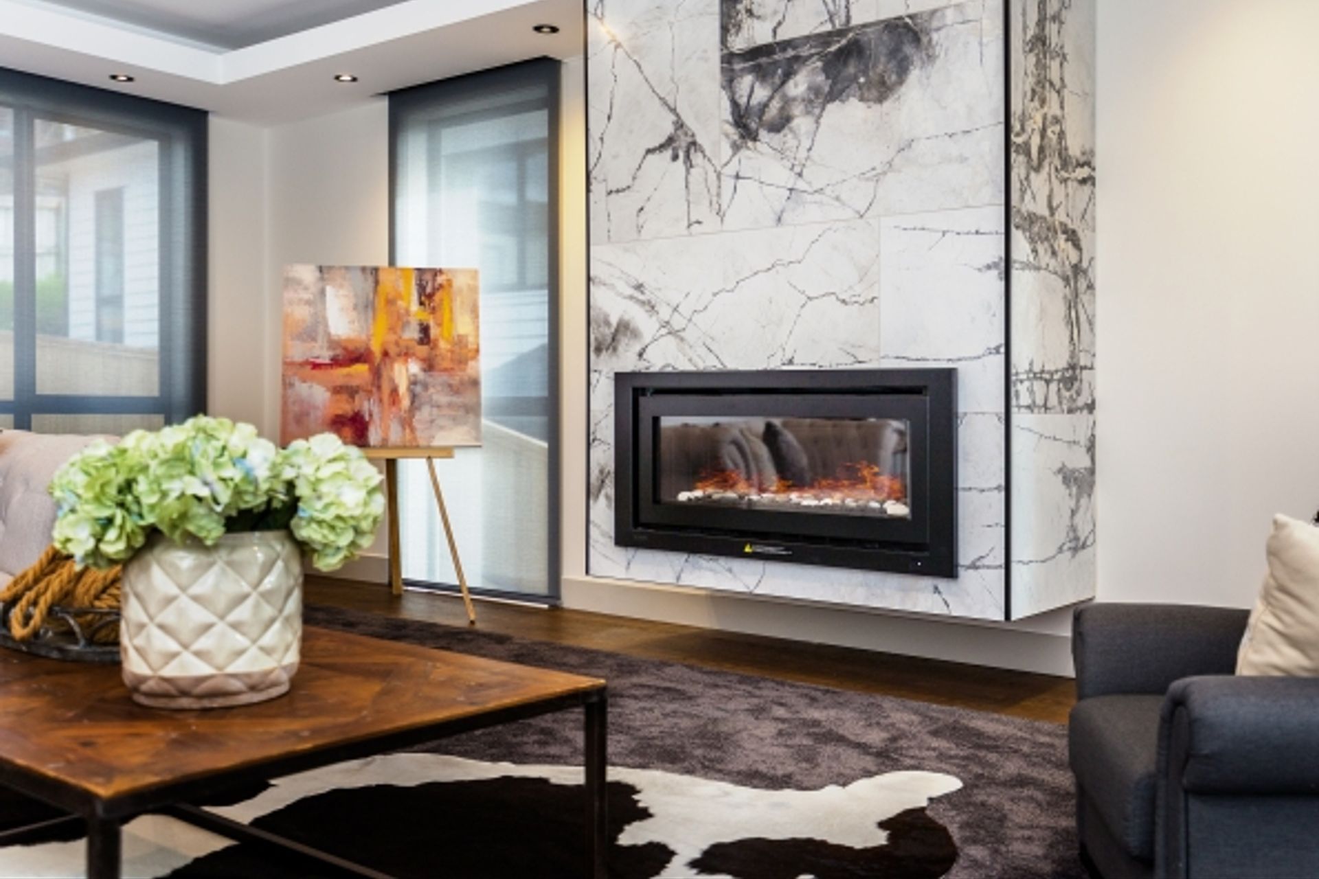 Lagonda Rise - Prime Grade Solid American White Oak in Herringbone Parquet w/ a two plank border and finished with a stain in 'Jacobean' and Waterborne Polyurethane