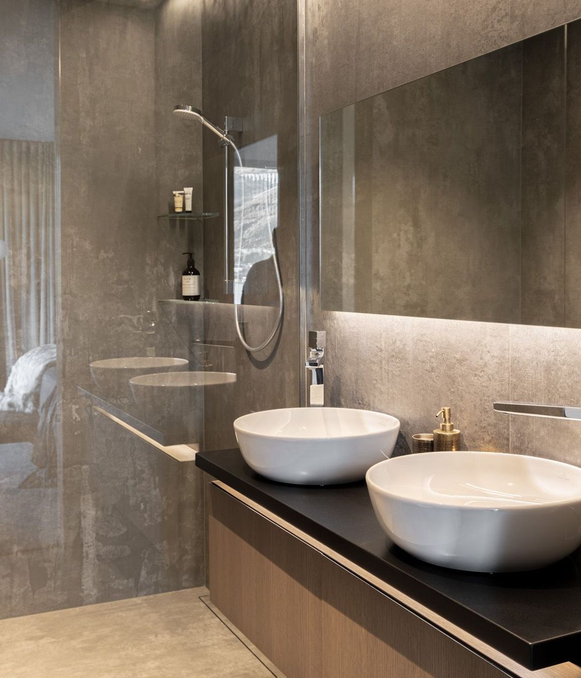 The shower and vanity in one of the bathrooms.