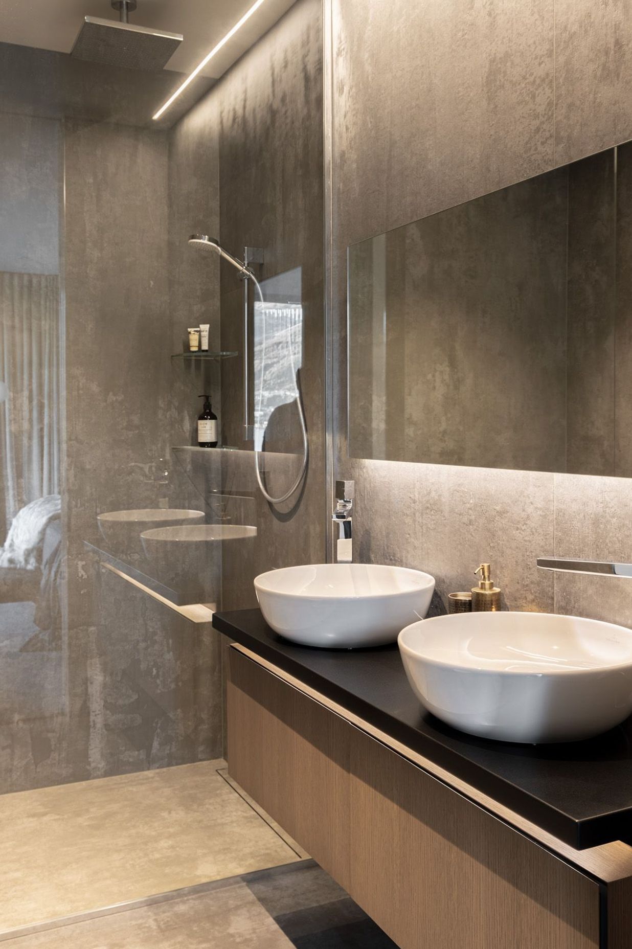 The shower and vanity in one of the bathrooms.