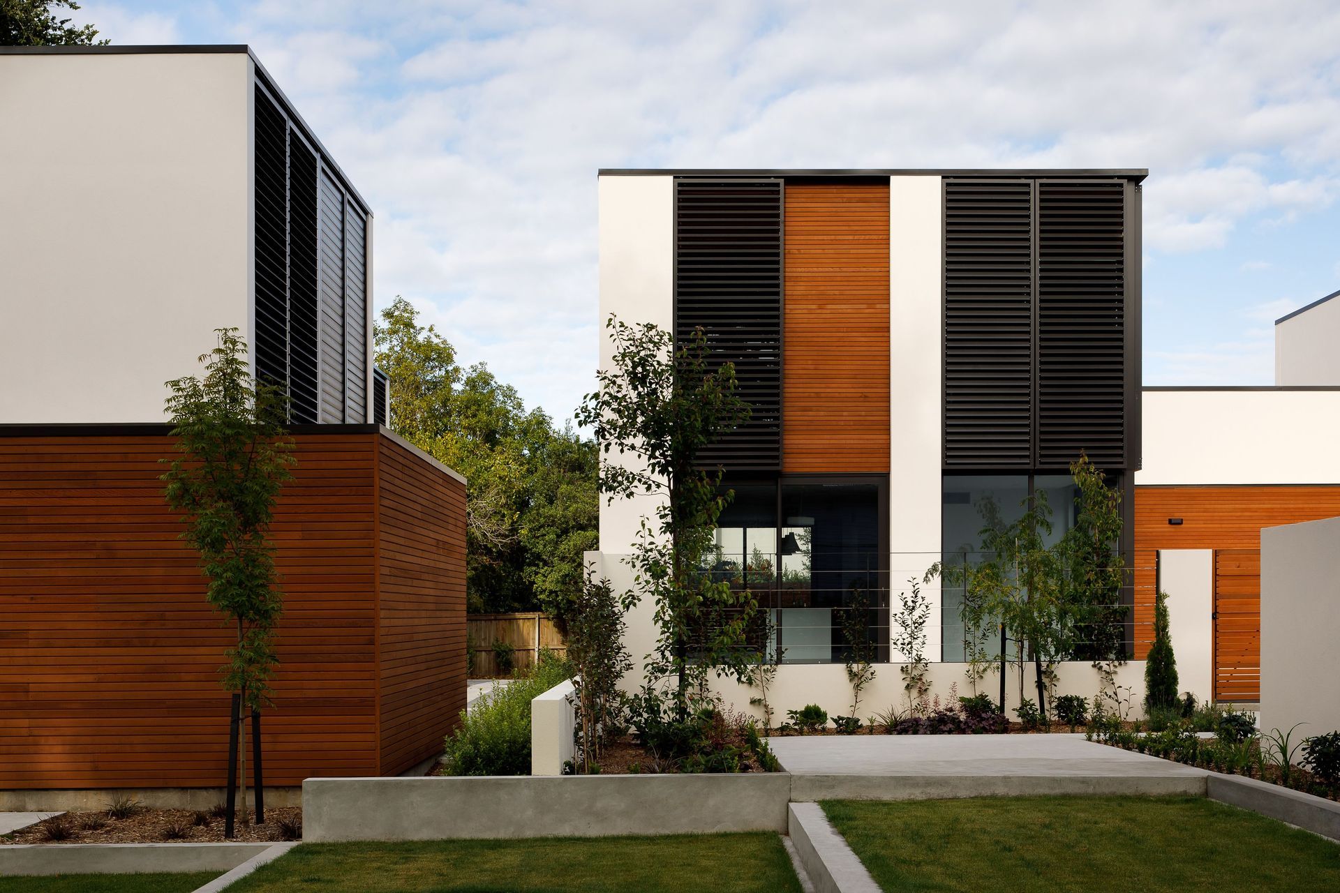 Each townhouse has its own private outdoor living area in addition to the communal grounds and riverside green.