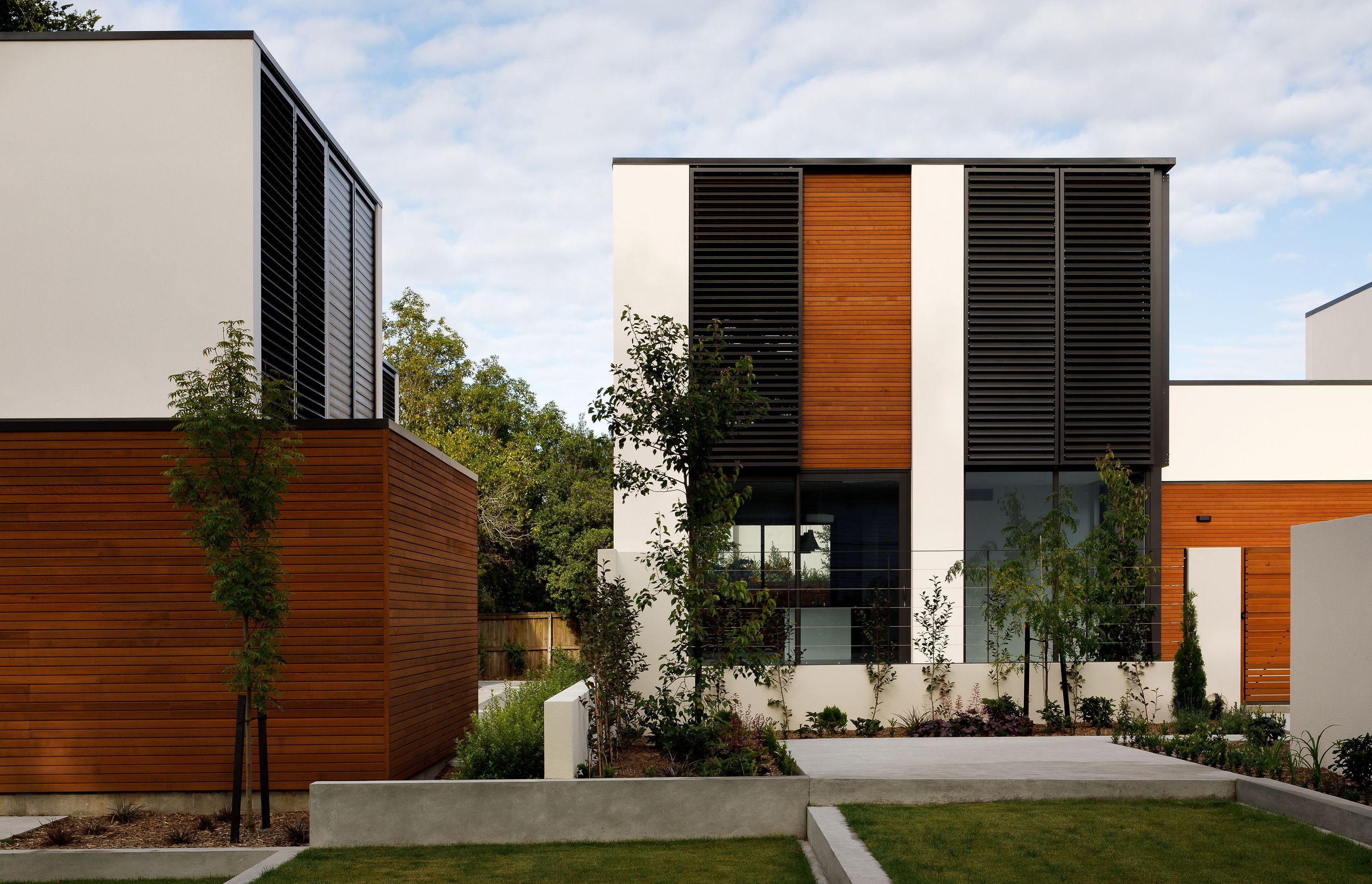 Each townhouse has its own private outdoor living area in addition to the communal grounds and riverside green.