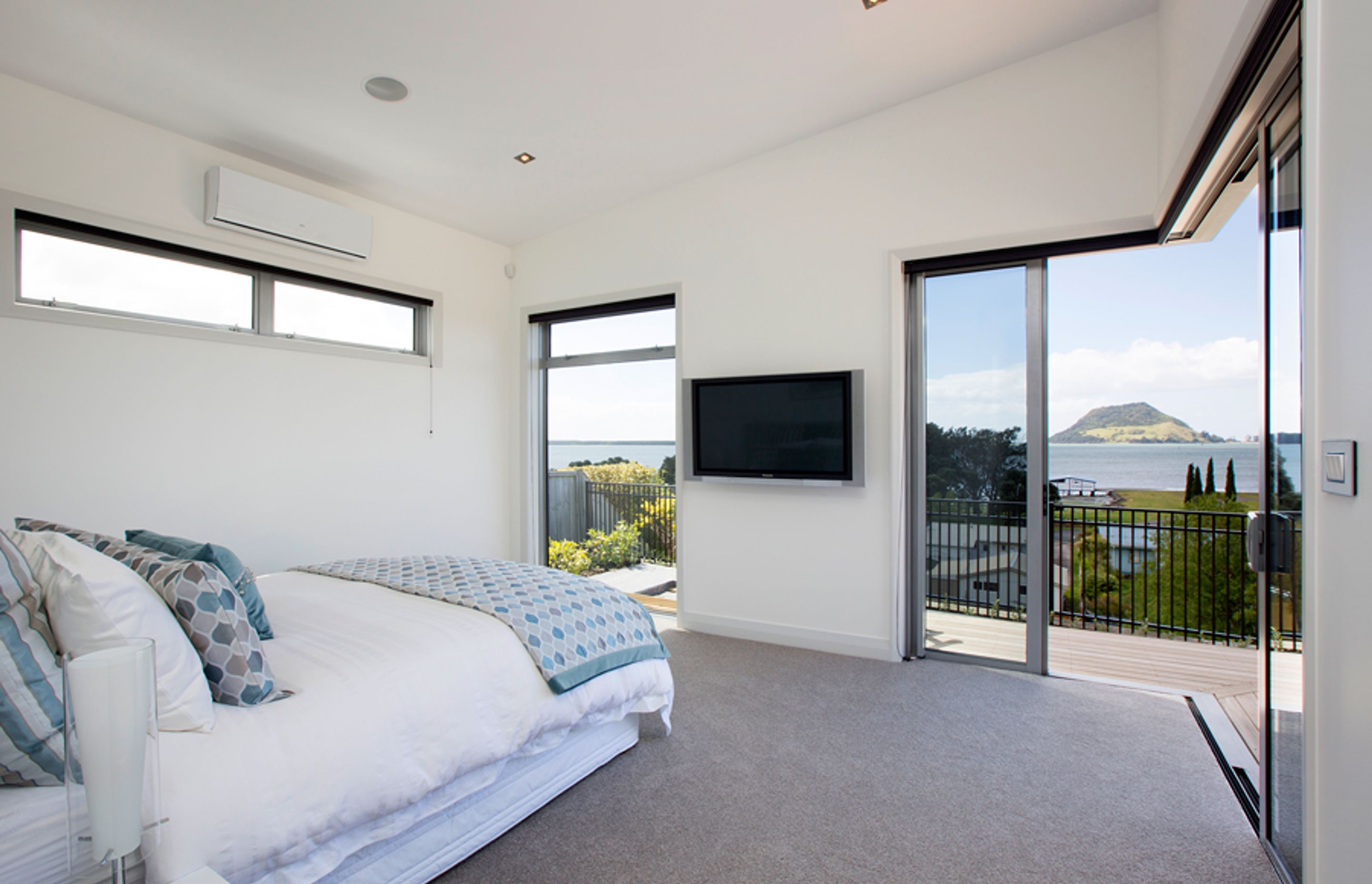 A bedroom designed to relax and take in the views. 