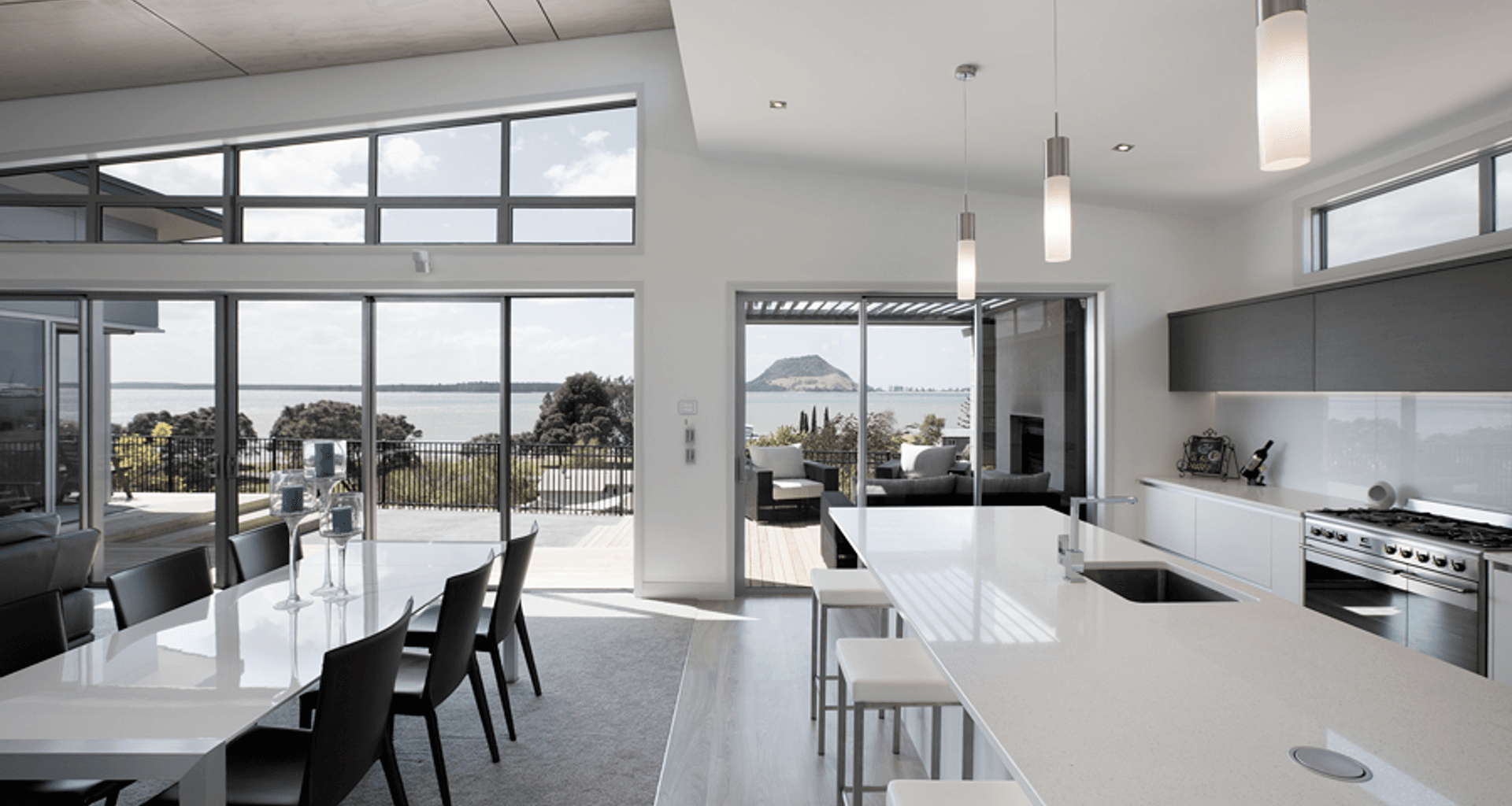 With amazing views out to Matakana and Mount Maunganui this three bedroom home stretches along the ridgeline and is built to take in the views.