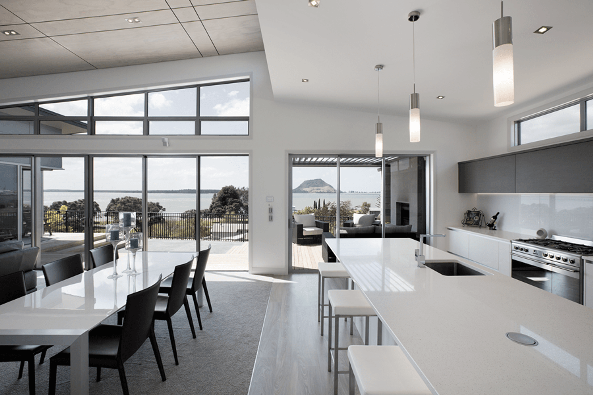 With amazing views out to Matakana and Mount Maunganui this three bedroom home stretches along the ridgeline and is built to take in the views.