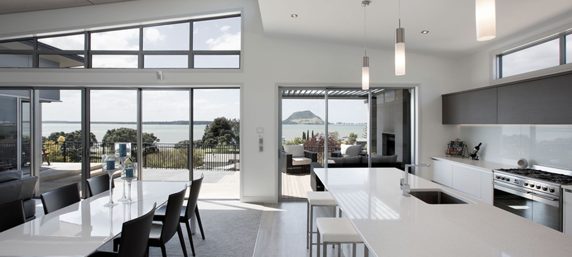 With amazing views out to Matakana and Mount Maunganui this three bedroom home stretches along the ridgeline and is built to take in the views.