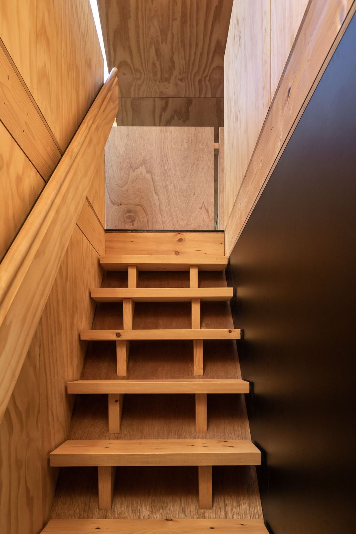 The extensive use of timber creates a feeling not unlike the experience of staying in an alpine hut.