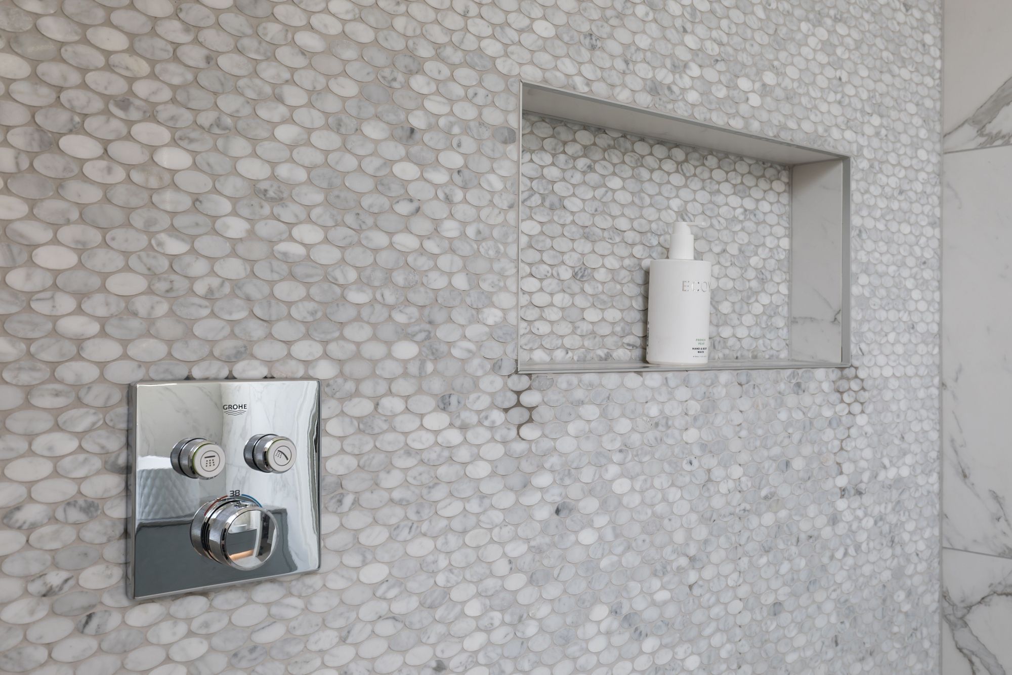 Ensuite Bathroom - adding texture and pattern through carrara marble mosaic tiles