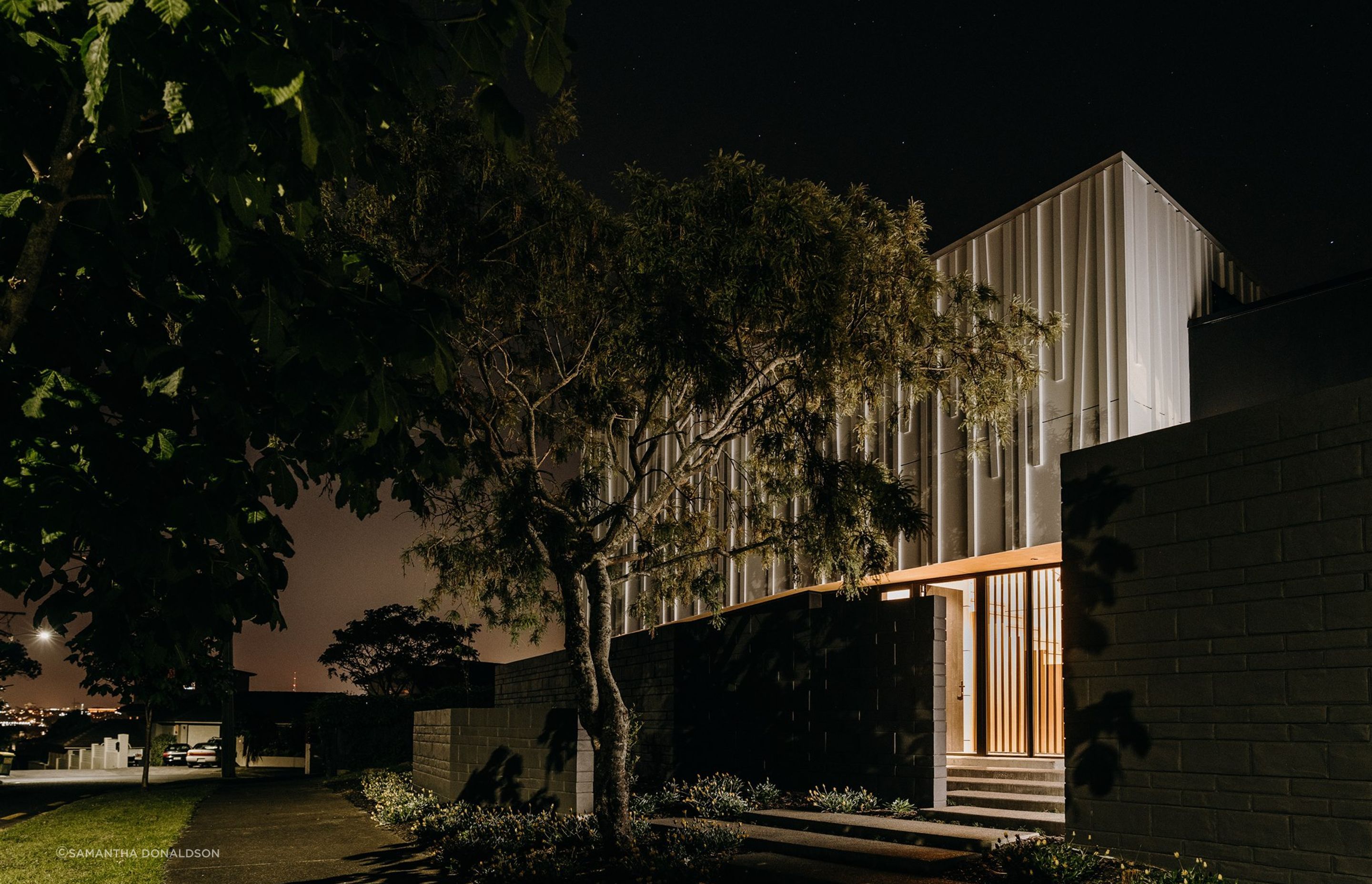 Imposing and private, the streetfront facade offers a level of intrigue giving little of the interiors away.