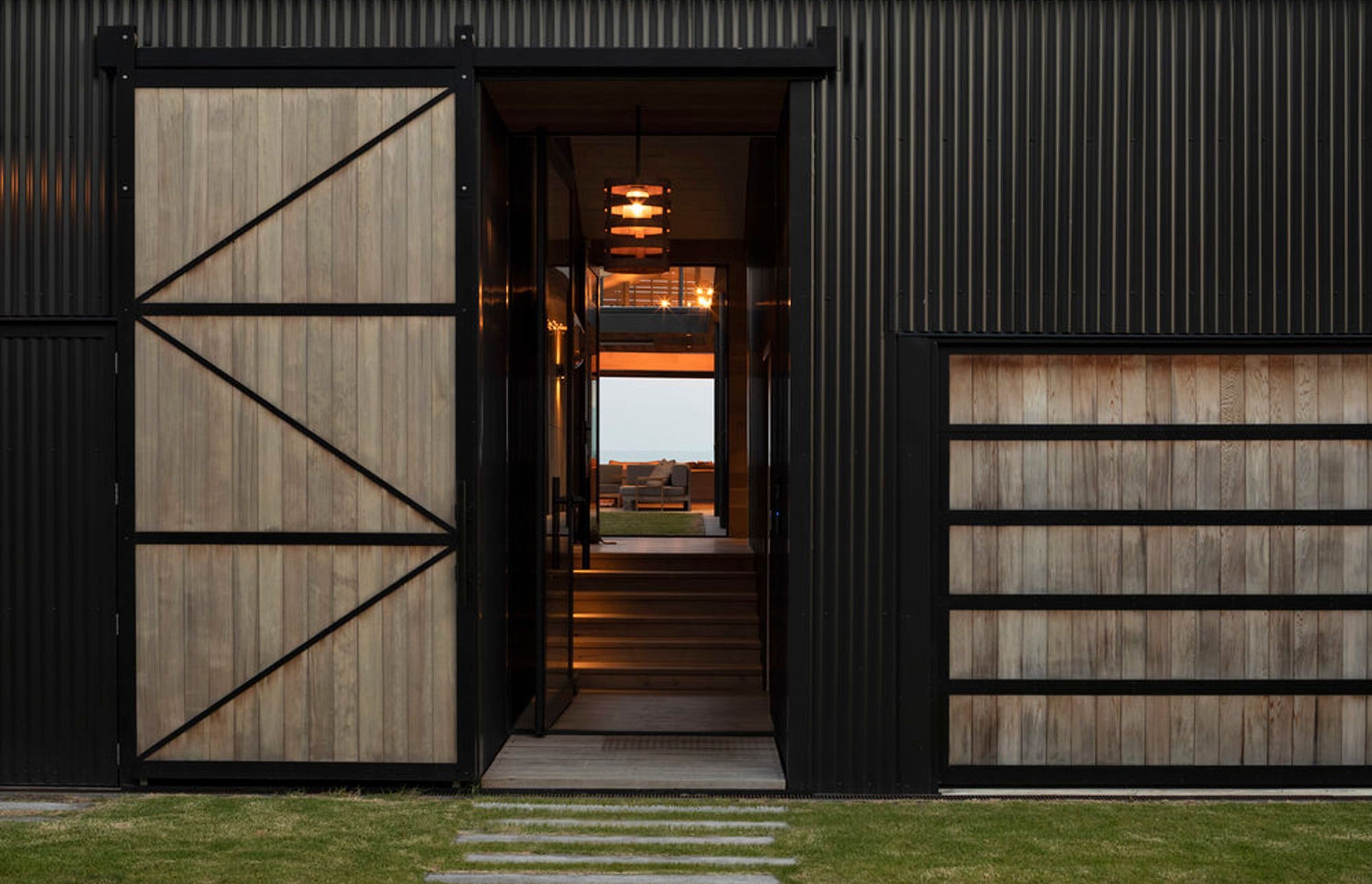 Immediately upon entry, the views through a central courtyard and the main house are captivating.