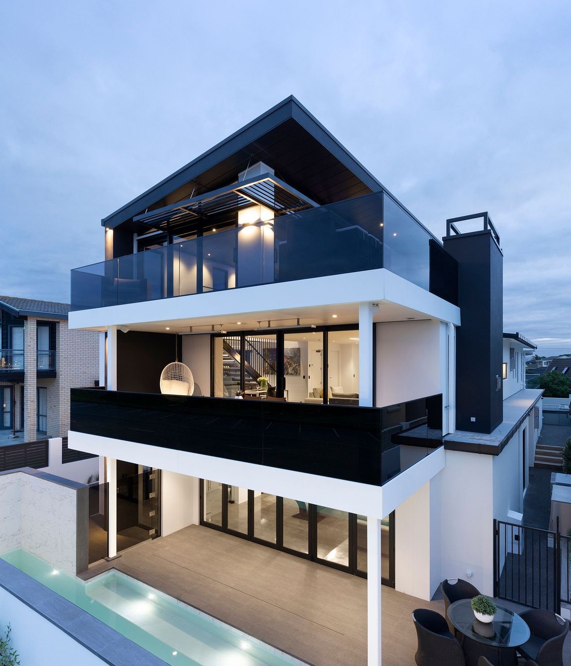 While the home is technically three storeys the ground level is split creating a fourth level. 