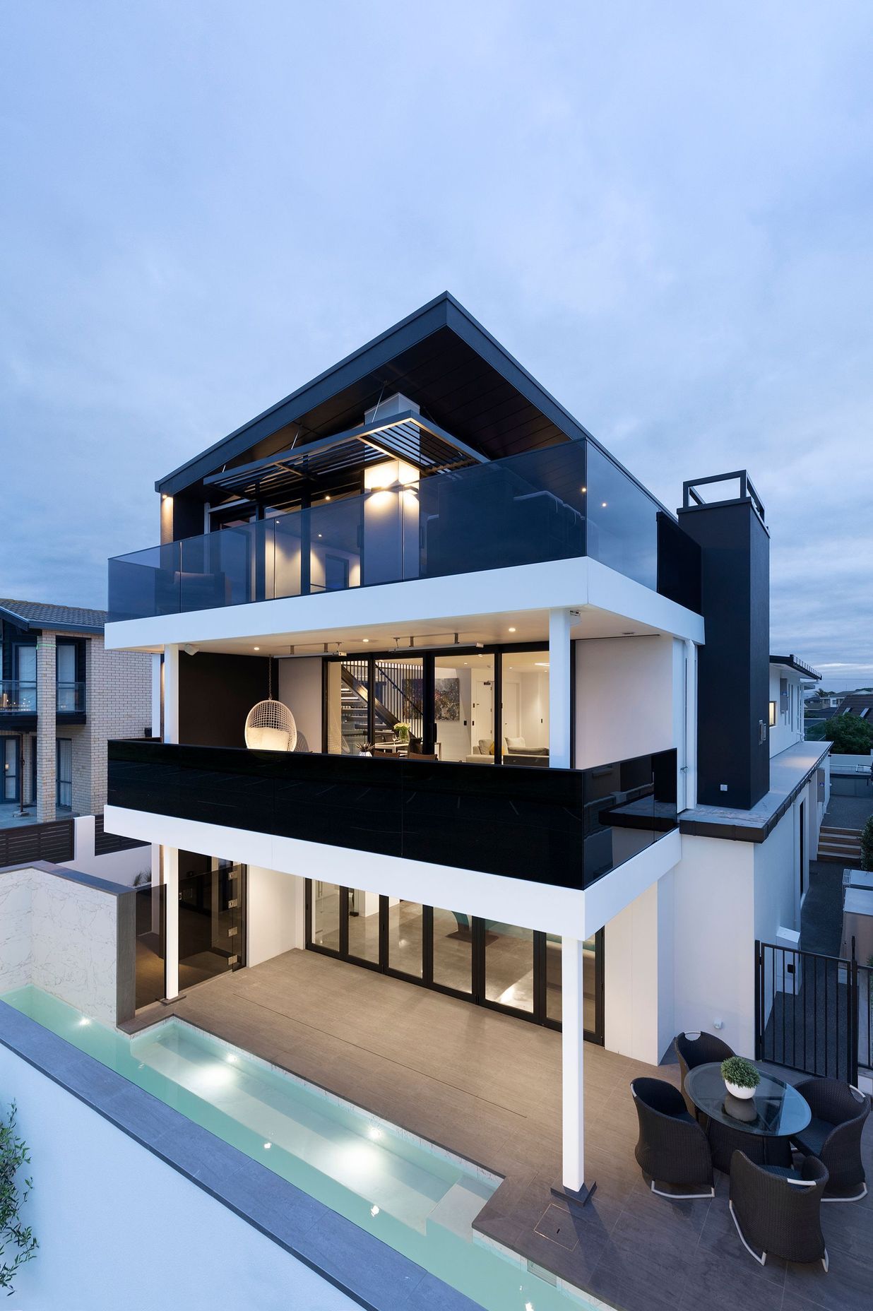 While the home is technically three storeys the ground level is split creating a fourth level. 