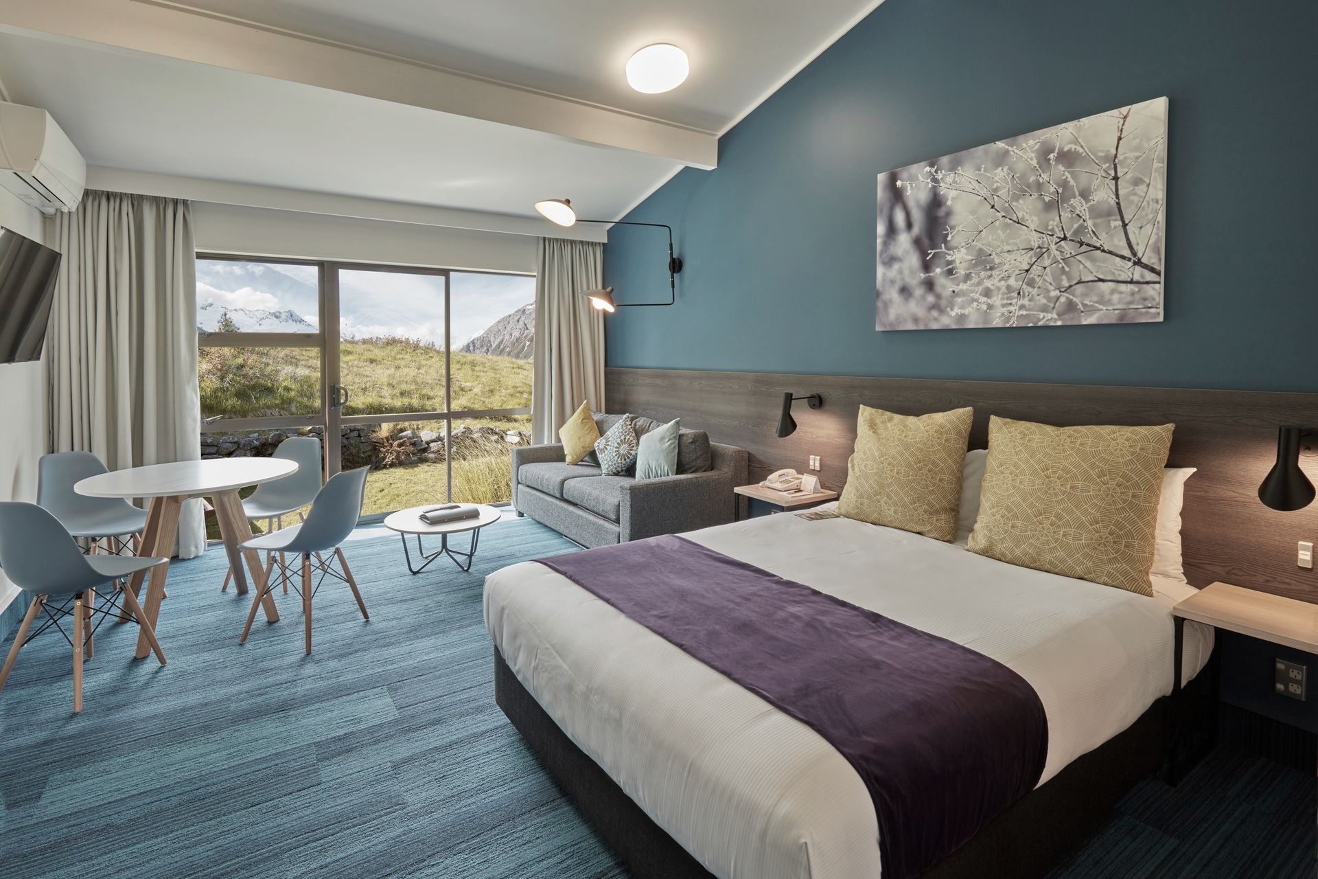 Drawing the outside in with palette and patterns, rooms vary in colour themes.