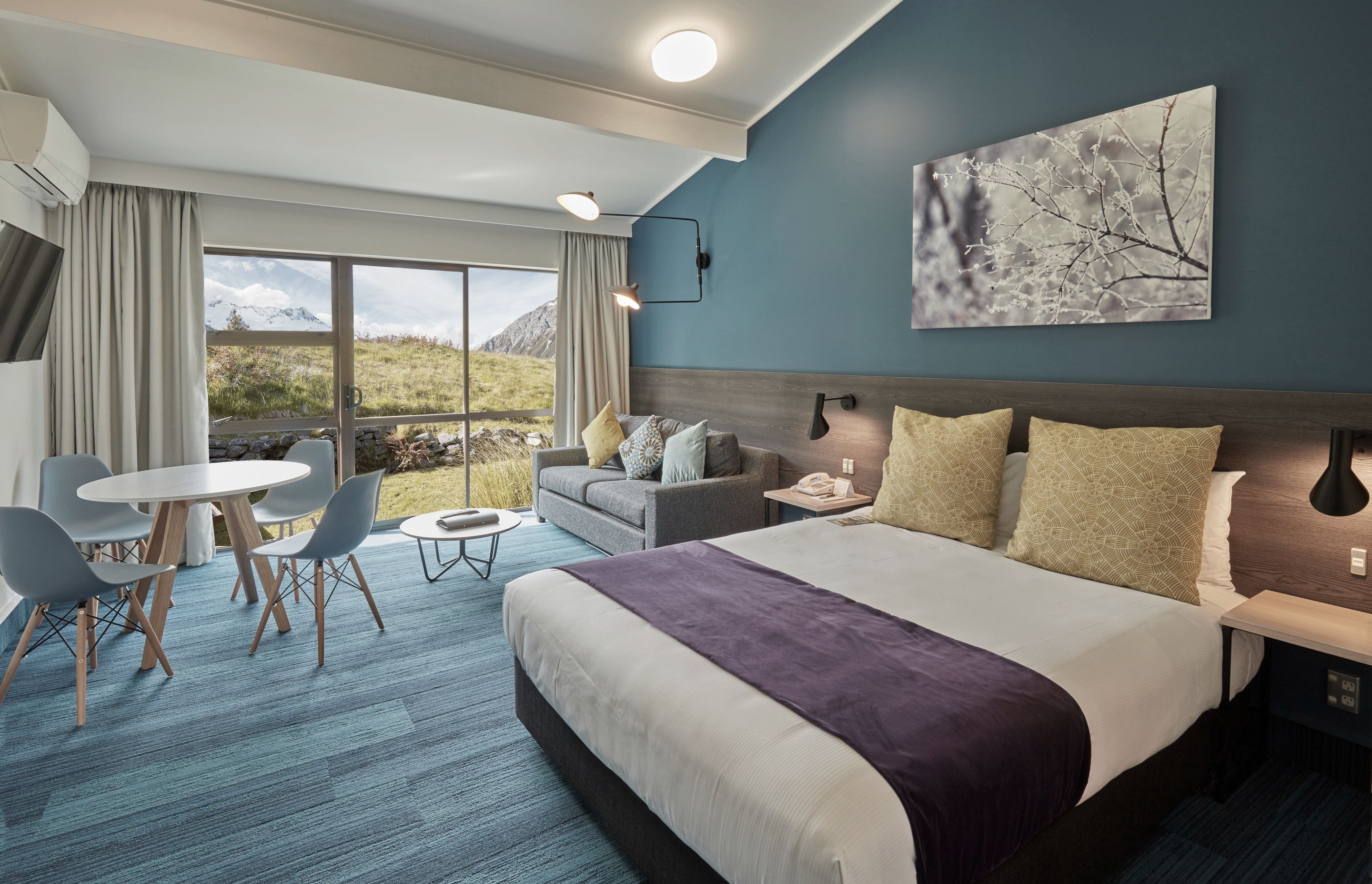 Drawing the outside in with palette and patterns, rooms vary in colour themes.