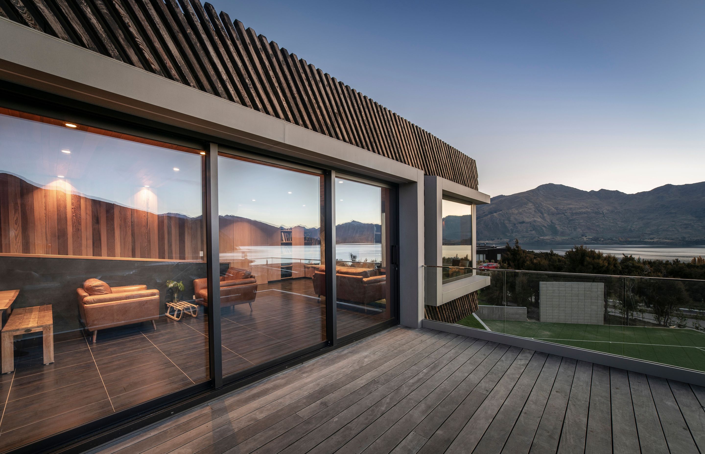 The upper-storey deck leading into the living area.