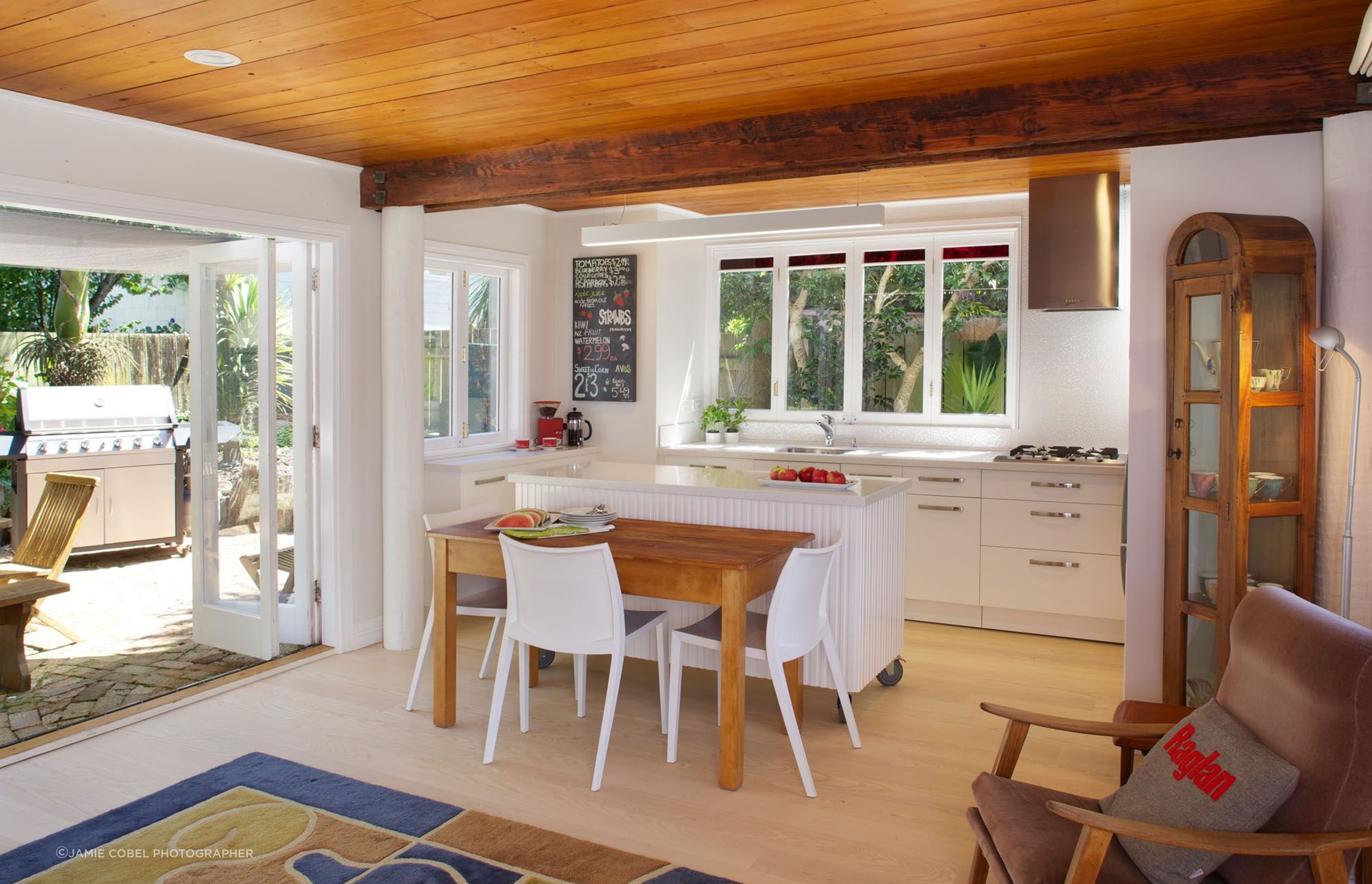 With a low Kauri ceiling forming the floor above, cabinetry and flooring is kept light to give the kitchen the aspired open and bright feel.