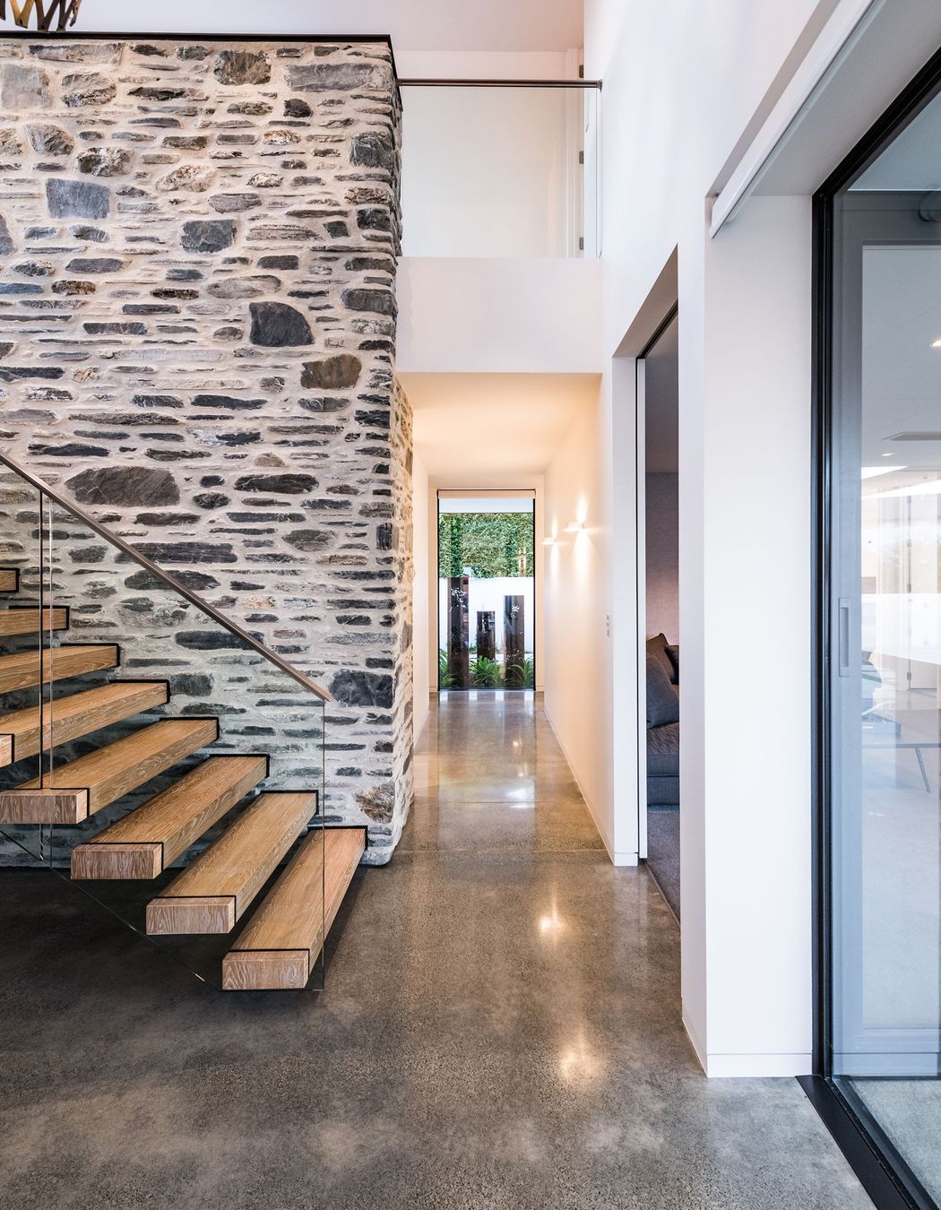 The bottom of the timber and stone staircase.