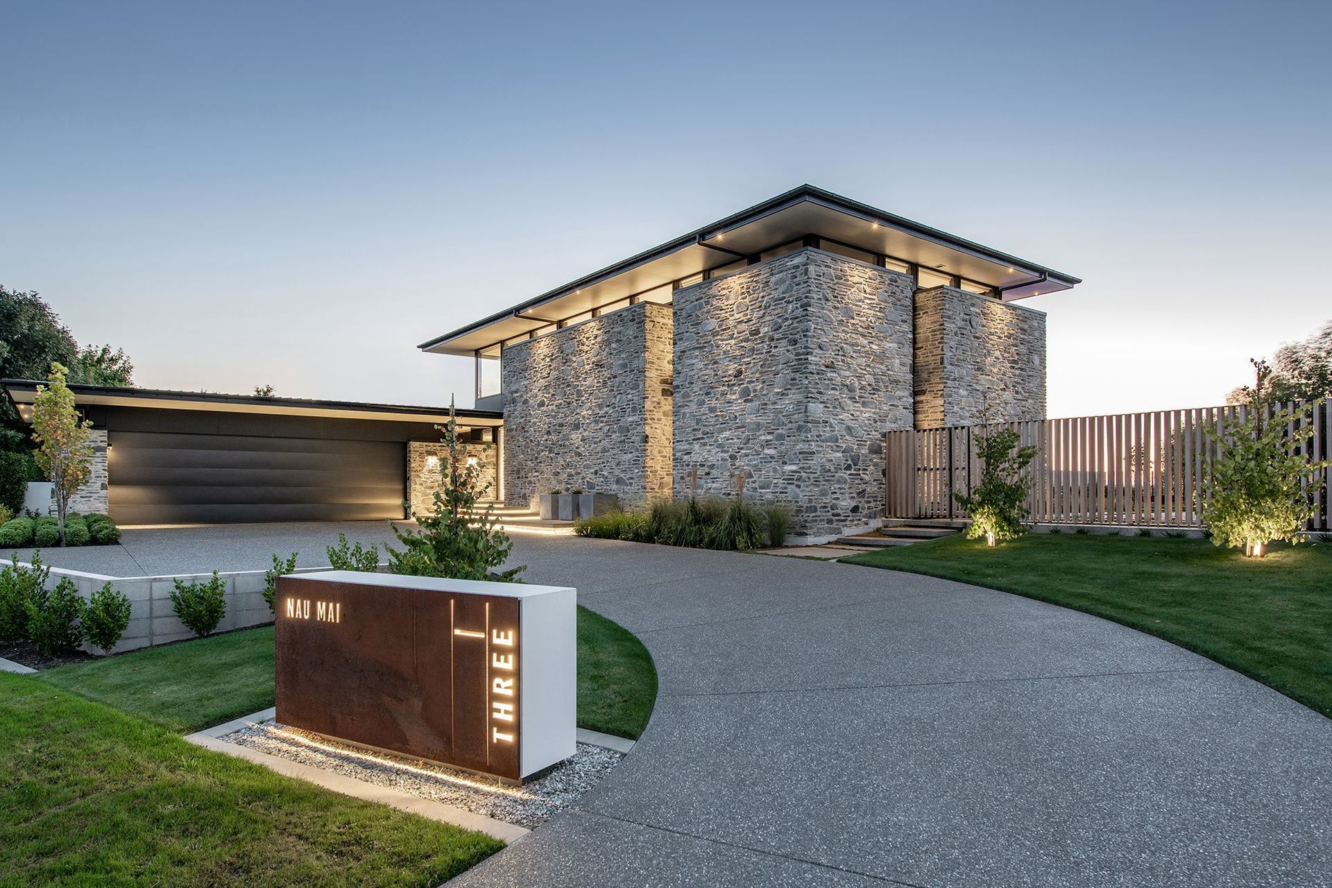 From the entrance to Nau Mai House, you are faced with a large monolithic stone form with a roof that appears to float above.