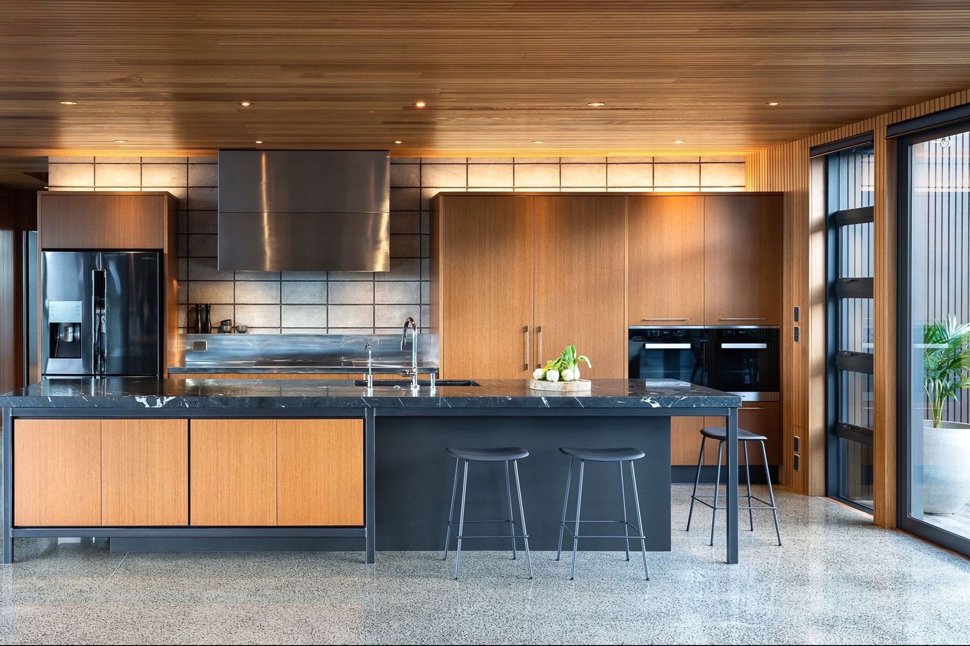 Keen to celebrate their new home’s industrial and natural materiality, our clients wanted a contemporary kitchen, designed with rawness & ‘honesty’. A concrete block wall was to feature in the kitchen yet be practical